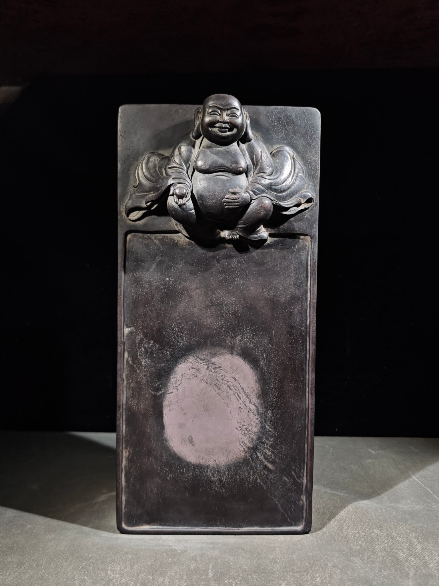 Maitreya Buddha; Duan Inkstone: Duan Inkstone with Maitreya Buddha: Made of famous Duanxi inkstone stone, carved with Maitreya Buddha seated statue on the inkstone head via relief craftsmanship, flat inkstone hall with clear