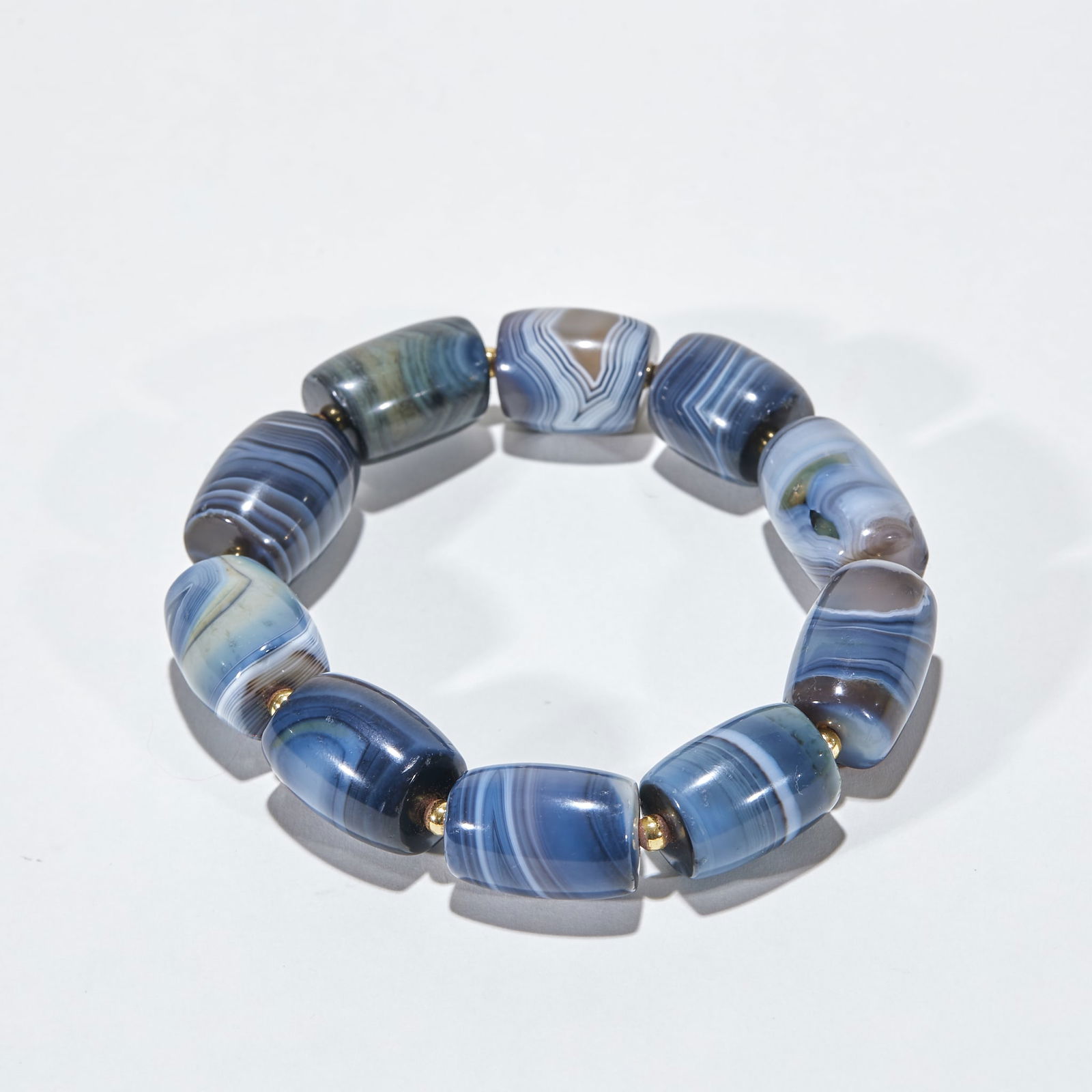 Sardonyx Bracelet: Sardonyx Bracelet: Material is natural sardonyx, made into a bracelet via grinding technique, single bead length 2cm, diameter 1.4cm, total weight 80g, sardonyx has unique and natural textures, the