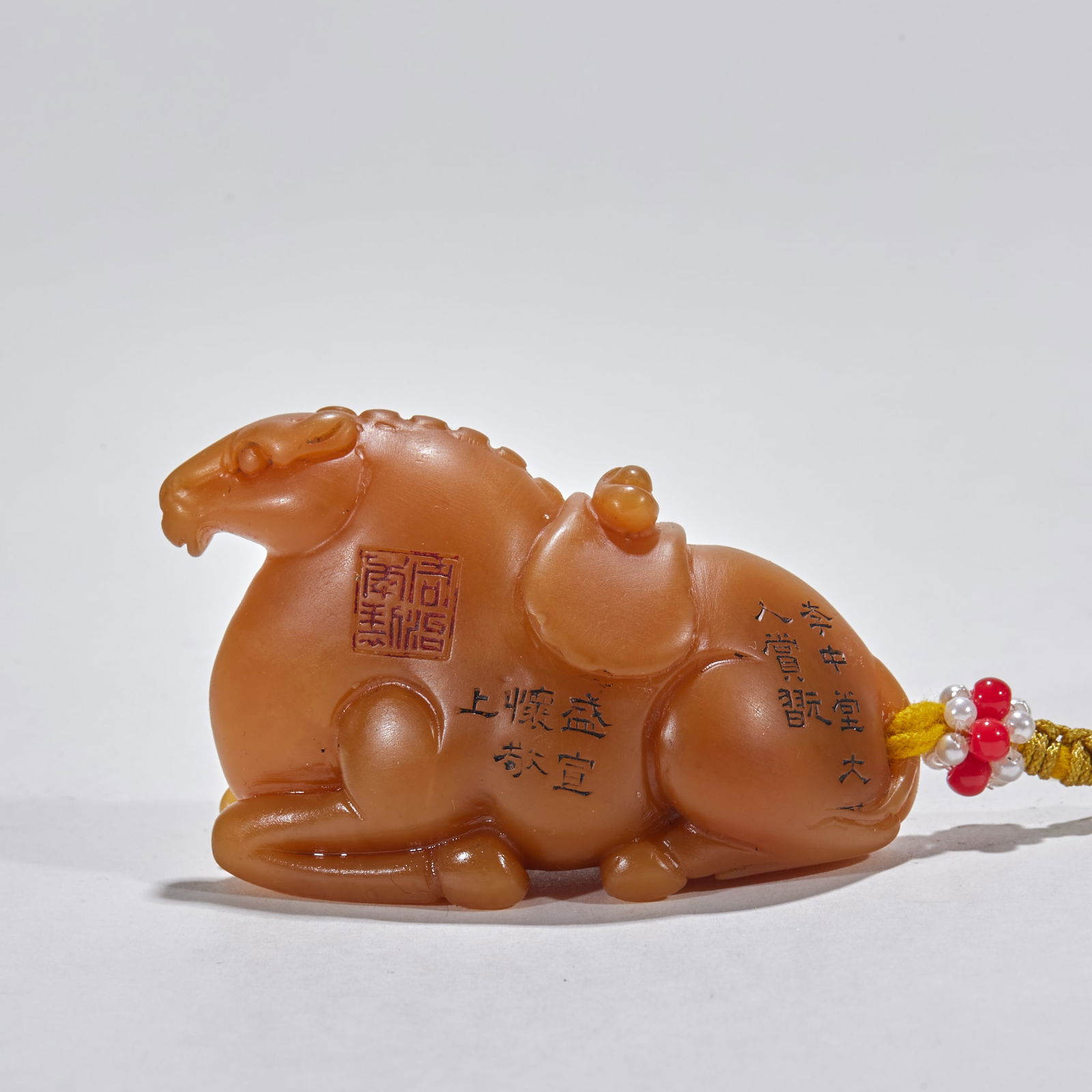 Tianhuang Stone Hand Piece: Wealth on Horseback: Tianhuang Stone "Wealth on Horseback" Hand Piece: Material is natural Tianhuang stone, carved into "Wealth on Horseback" theme via round carving technique, specifications height 4cm, length 6.5cm,