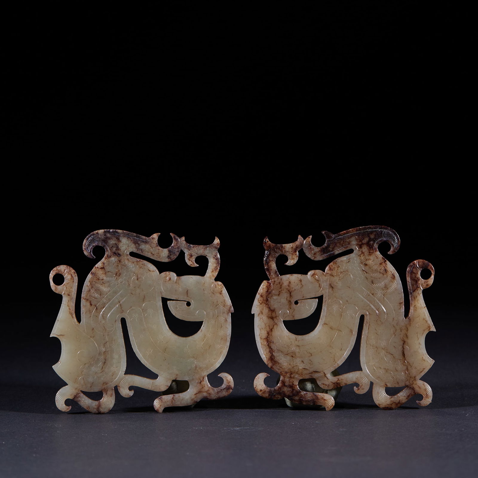 Pair of Ancient Jade Auspicious Beast Pendants: Pair of Ancient Jade Auspicious Beast Pendants: Made of ancient jade via openwork and intaglio techniques, jade with natural infiltration color, vigorous auspicious beast shape and smooth lines,