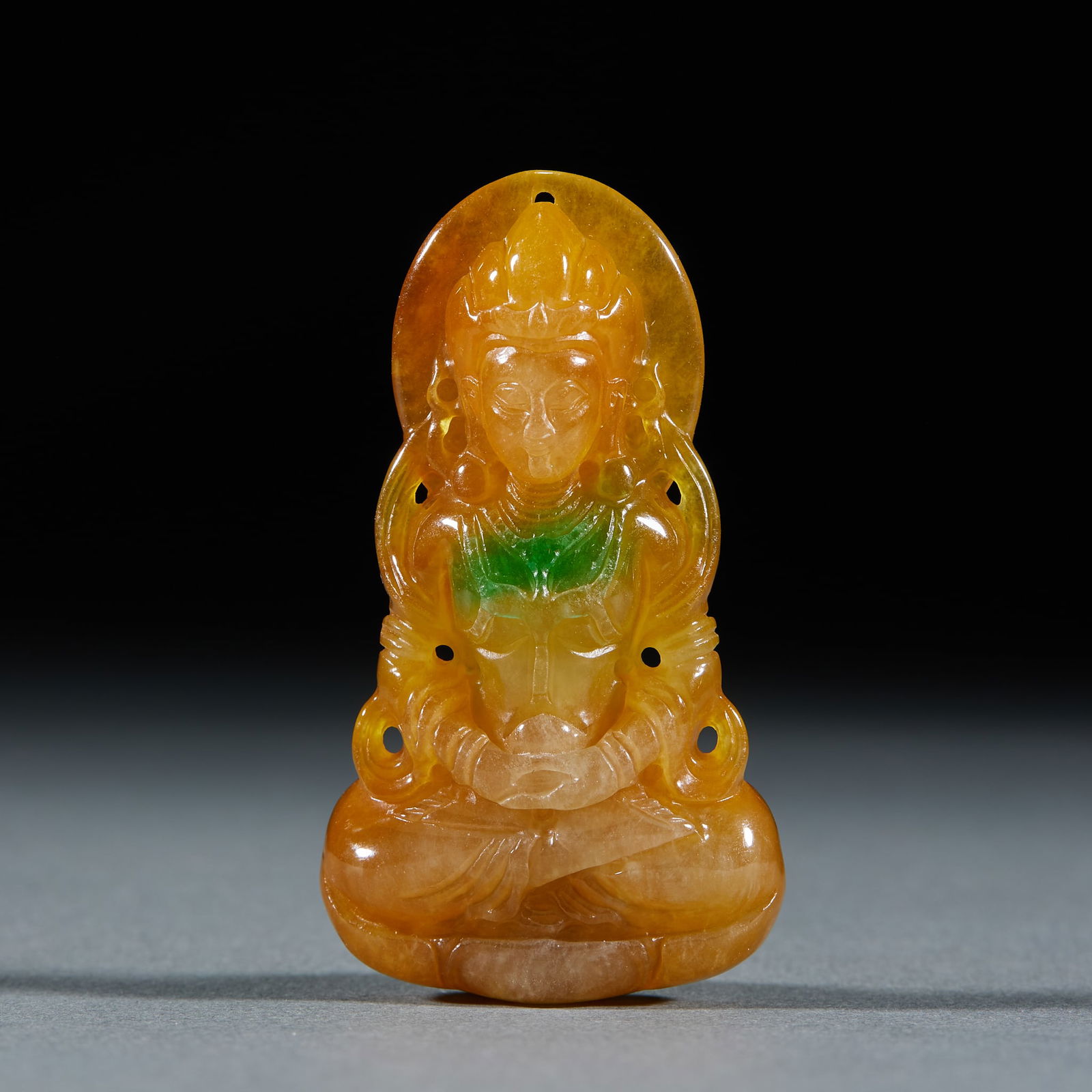 Yellow Jadeite Guanyin Statue: Yellow Jadeite Guanyin: Material is yellow jadeite, carved into Guanyin statue via round carving and intaglio techniques, partial with green skillful color, kind face and smooth clothing lines,