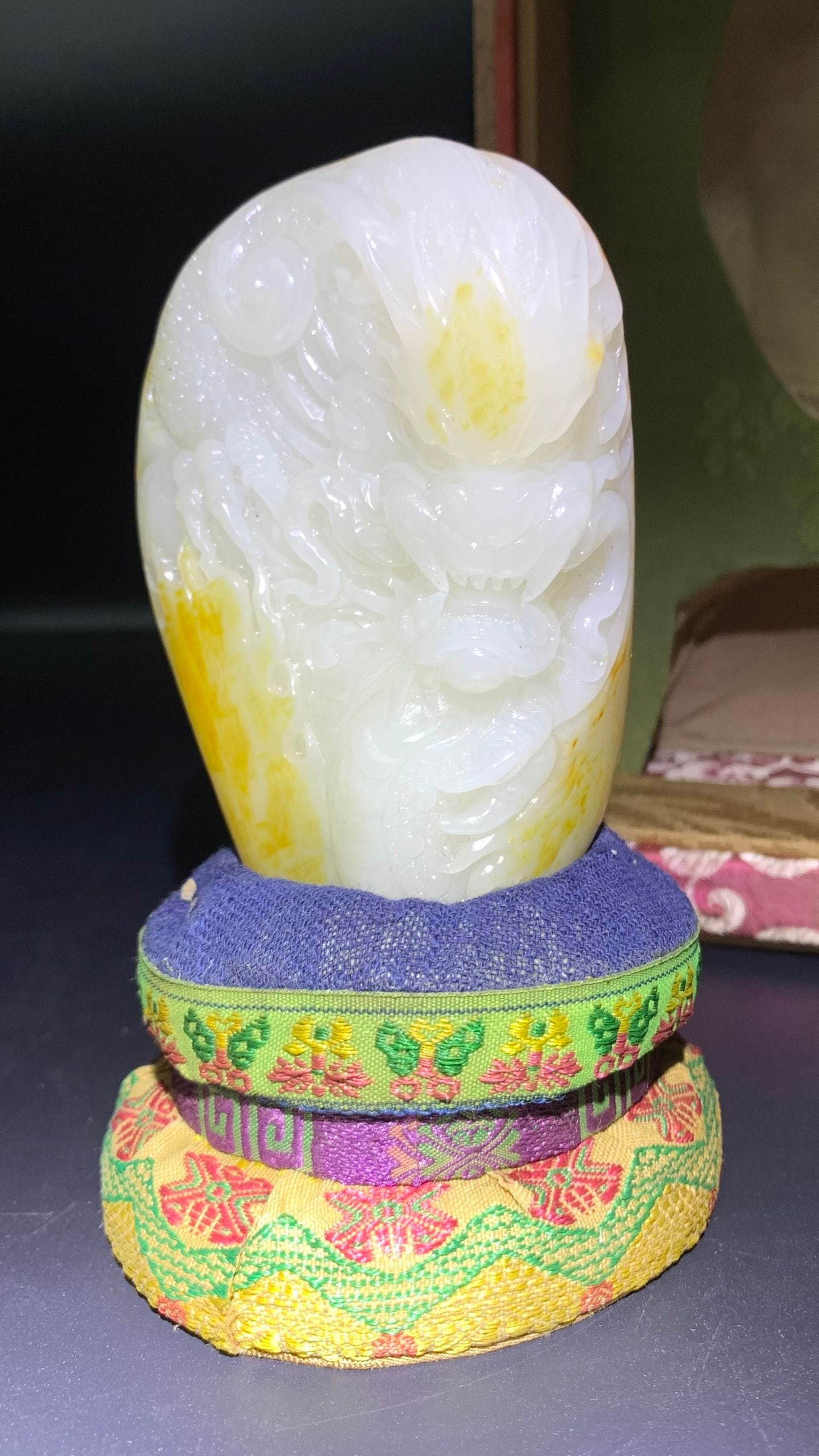 Hetian Jade Dragon: Hetian Jade Dragon: Material is Hetian jade, carved with dragon pattern via round carving and relief techniques, using natural yellow skin skillful color, warm jade texture and vigorous lines, height