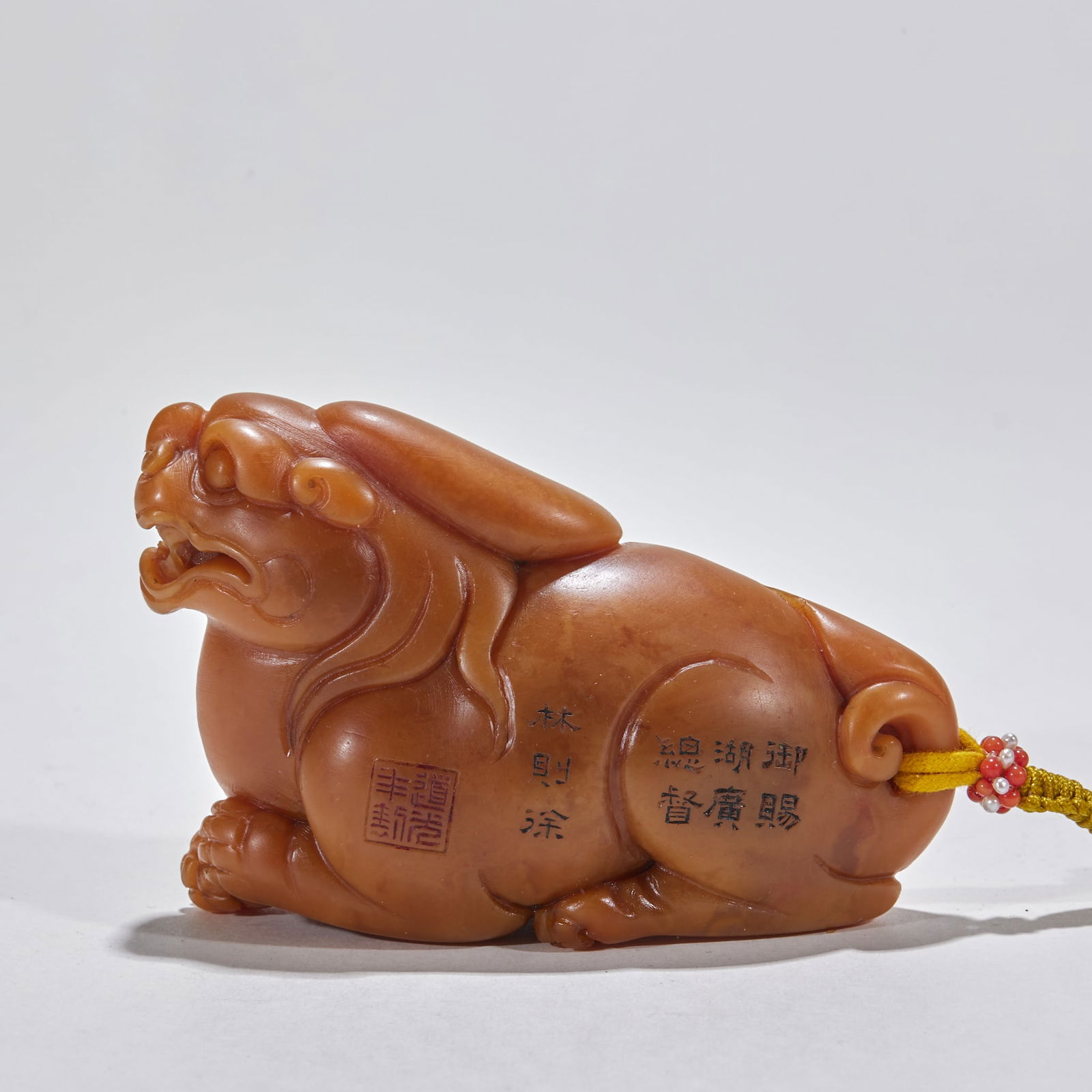 Tianhuang Stone Auspicious Beast Ornament: Tianhuang Stone Auspicious Beast: Made of Tianhuang stone via round carving, marked with “Lin Zexu” and inscribed with “Imperially Bestowed to Viceroy of Huguang”, height 6cm, length