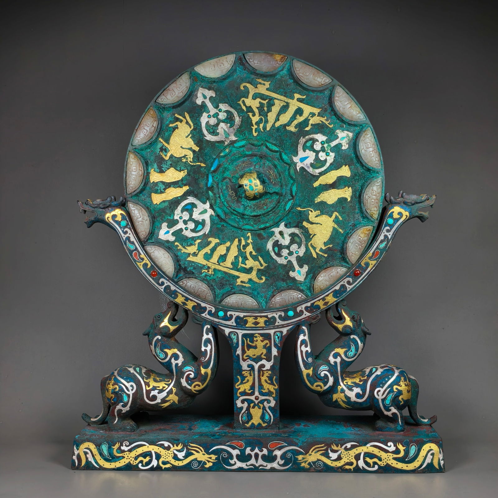 Warring States-Han Style Gold & Silver Inlaid Bronze Mirror (with Auspicious Beast Stand): Warring States-Han Style Bronze Mirror Inlaid with Gold, Silver and Jade (with Auspicious Beast Stand): Material and craftsmanship: bronze casting, inlaid with gemstones and jade via gold-silver inlay