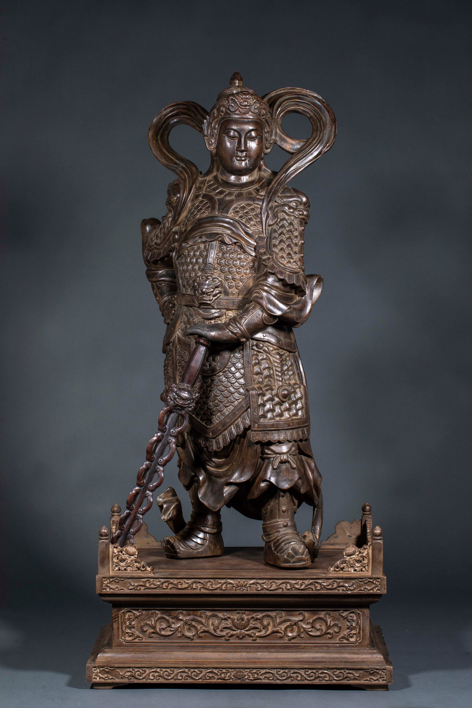 Agarwood Statue of Skanda Bodhisattva: Agarwood Statue of Skanda Bodhisattva: Material and craftsmanship: carved from a solid piece of agarwood, solemn Skanda statue, fine armor patterns, mellow agarwood fragrance; specifications: height