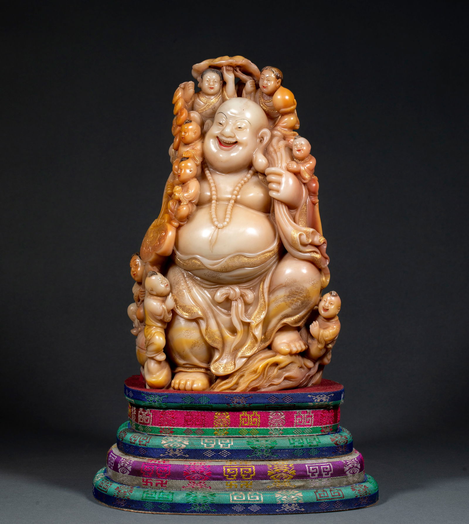 Shoushan Stone Maitreya with Pine Nut Ornament: Shoushan Stone Maitreya with Pine Nut Ornament: Material and craftsmanship: carved from a whole piece of Shoushan stone, festive and peaceful Maitreya statue, auspicious pine nut theme, delicate and v