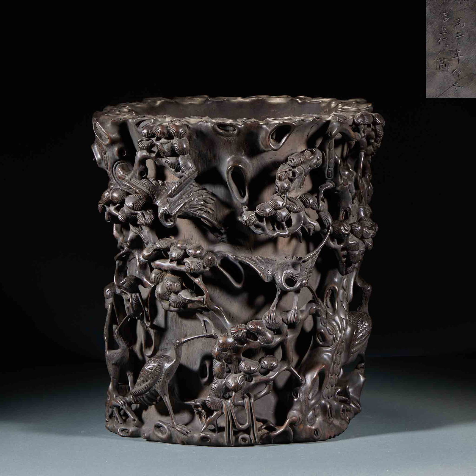 Agarwood Brush Pot with Pine & Crane Pattern: Agarwood Brush Pot with Pine & Crane Pattern: Material and craftsmanship: hollow carved from a whole piece of agarwood, auspicious pine & crane theme, solid agarwood texture and mellow fragrance, deli