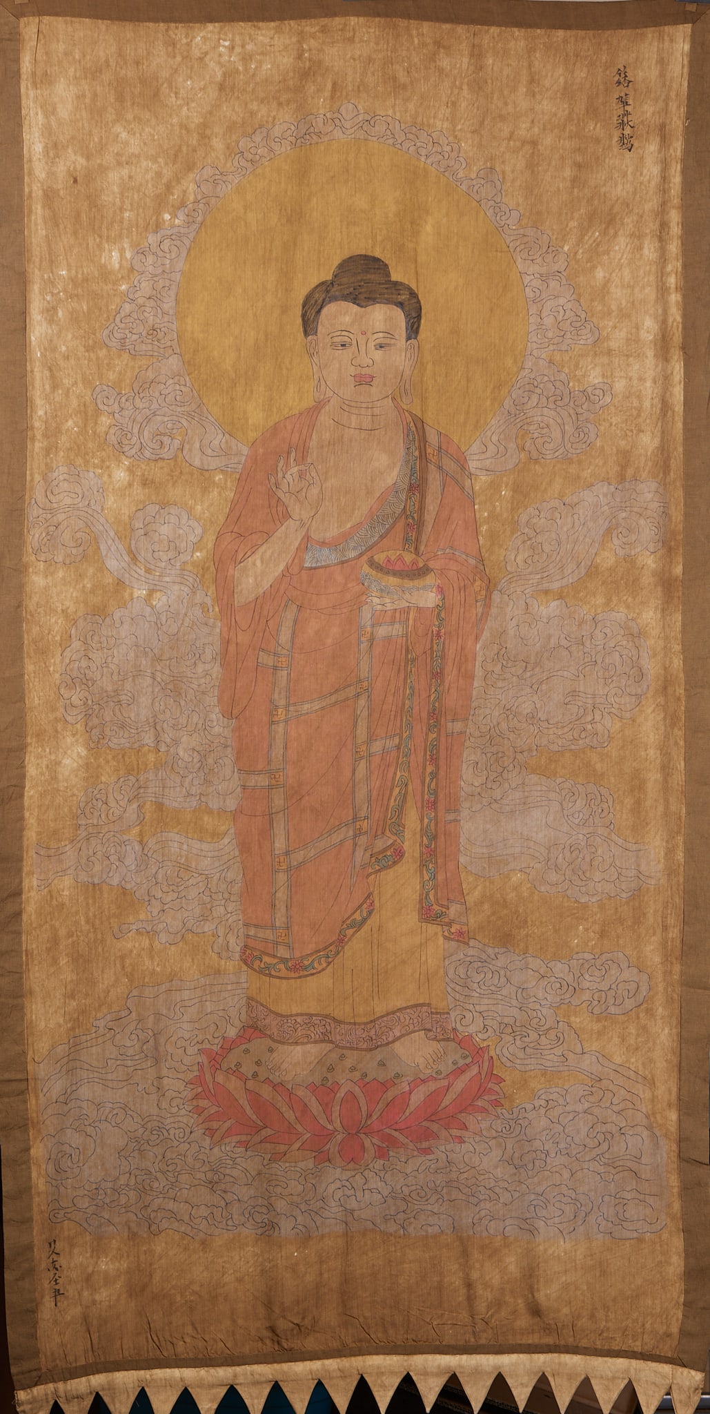 Silk Banner of Sakyamuni Statue with Khitan Characters: Silk Banner of Sakyamuni Statue with Khitan Script: Silk color standing Sakyamuni with Khitan characters beside, mounted as ancient solemn banner; specifications: length 178cm, width 90cm; cultural