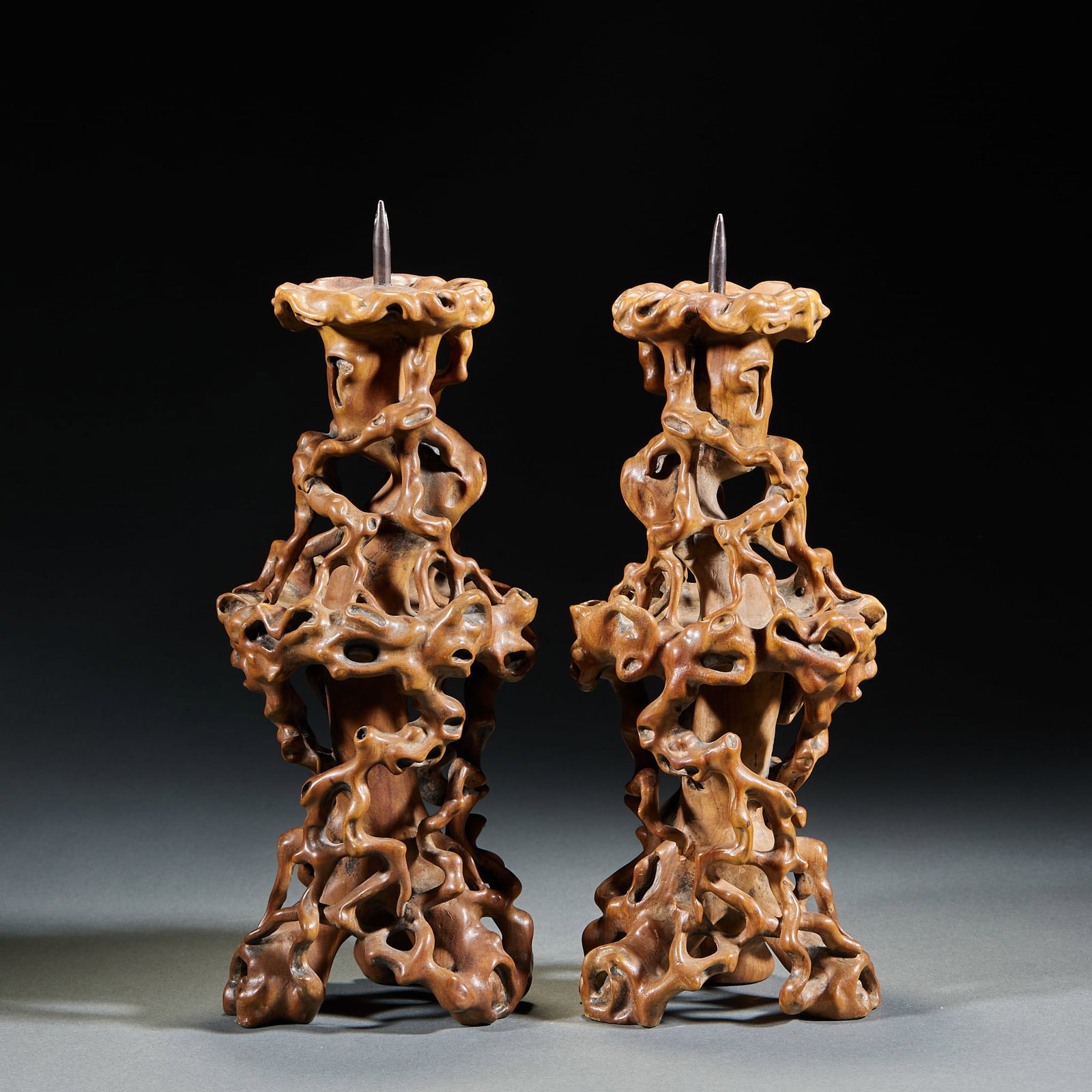 Boxwood Candlestick: Pair of Boxwood Candlesticks: Whole hollow carved boxwood candlesticks imitating root knot shape with candle pin on top, complete paired preservation, warm wood and thick patina; specifications: heigh