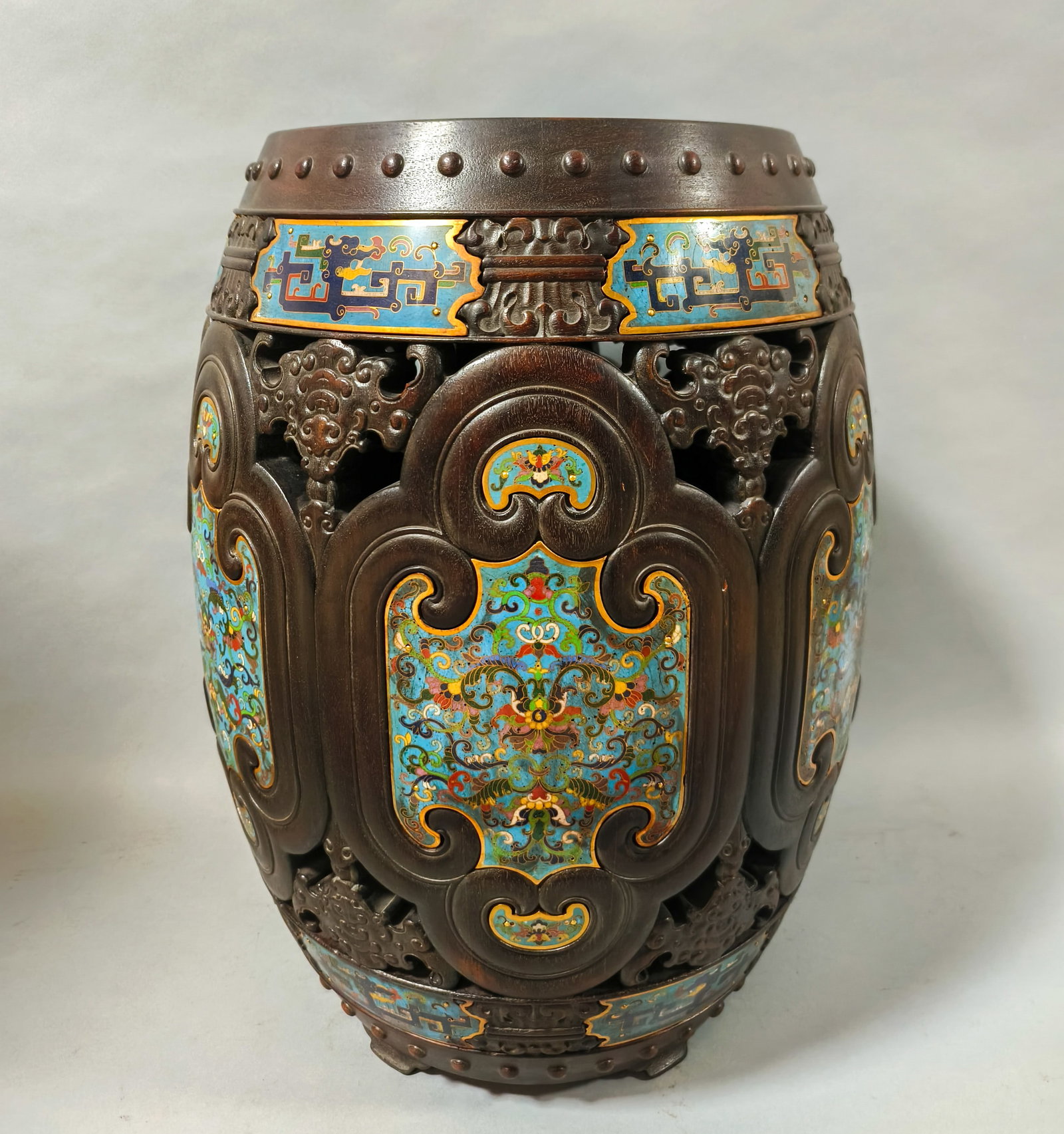 Pair of Rosewood Enamel-Inlaid Floral Pattern Stools: Pair of Rosewood Embroidered Stools Inlaid with Enamel Floral Scrolls: Material is rosewood. Crafted with openwork and relief carving, inlaid with cloisonné enamel and carved with floral scrolls, wel