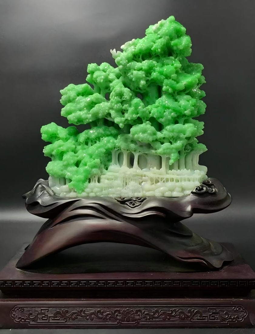 Full Green Jadeite "Money Tree": Full Green Jadeite "Money Tree" Ornament: Material is natural jadeite, carved with money tree and landscape in round relief, emerald green and transparent texture with solid wood base. Size: Height 30