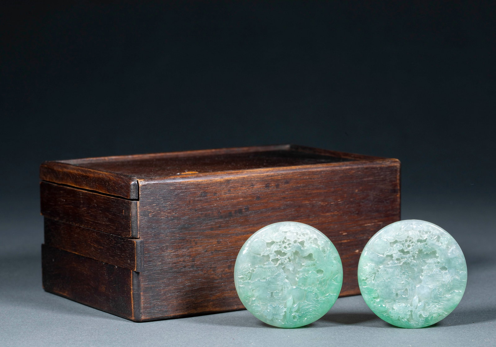 Exquisitely Carved Landscape Jade Pendant, A Pair: Exquisitely Carved Landscape Jade Pendant, A Pair: Crafted of natural jadeite with shallow relief carving of landscape and pavilion patterns, translucent texture, preserved as a pair. Specifications:
