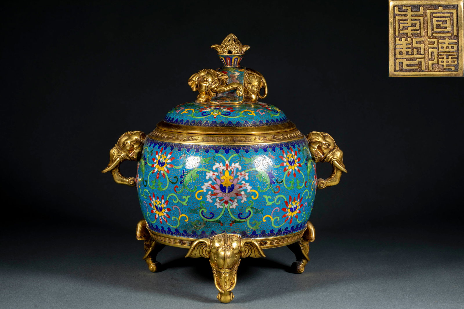 Xuande Mark Cloisonn? Enamel Peace Elephant Censer: Xuande Mark Cloisonné Enamel Peace Elephant Censer: Copper-body cloisonné enamel censer decorated with interlocking lotus patterns, fitted with elephant knob cover, bearing "Made in Xuande Reign" ma