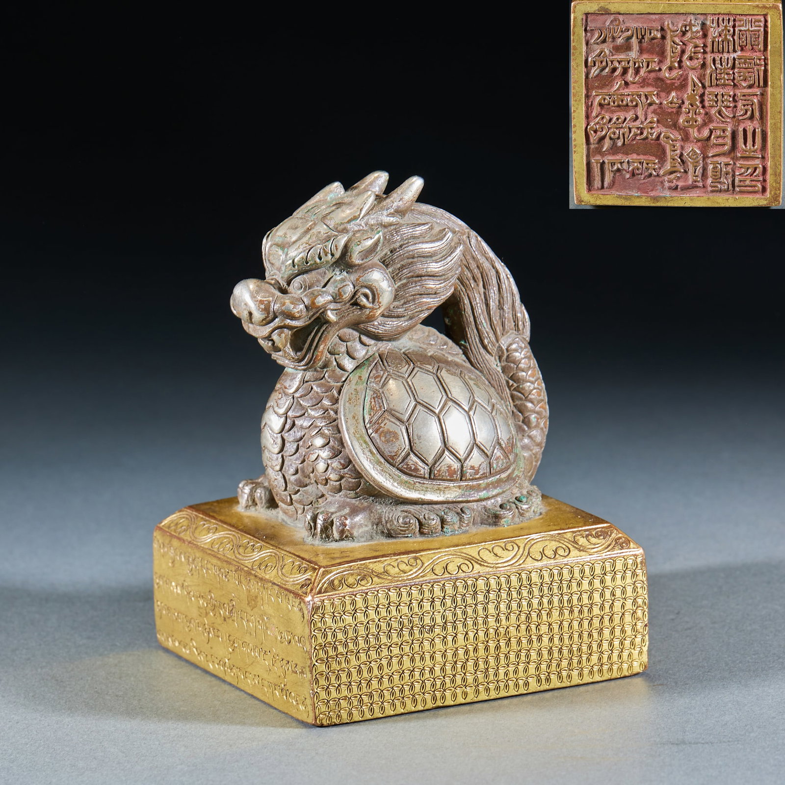 Gilt Bronze and Silver Lion Knob Seal: Gilt and Silver Plated Bronze Lion Knob Seal: Made of bronze partially gilt and silver plated, carved with lion-shaped knob and inscribed with Manchu characters on the body with thick aged patina. Spe