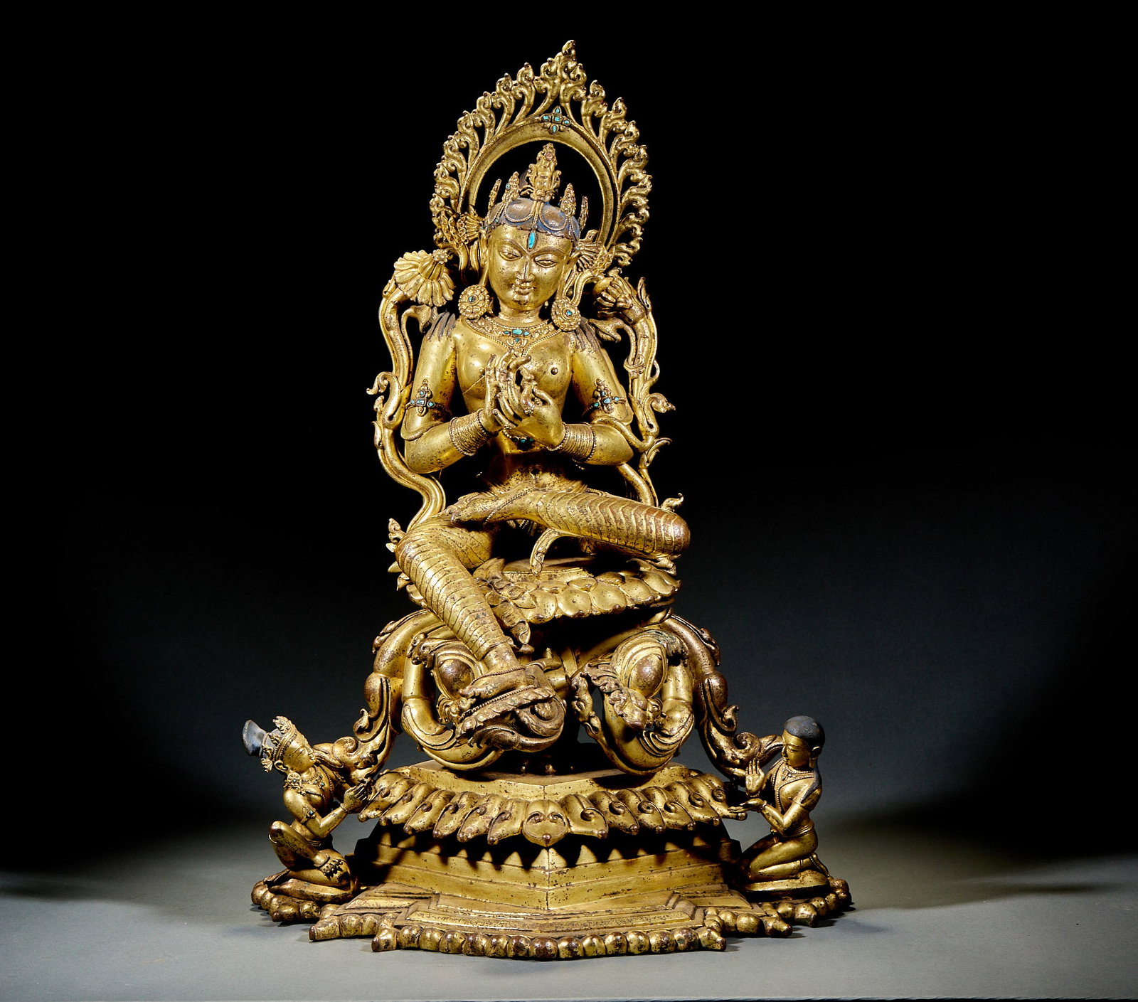 Ming Dynasty Gilt Bronze Green Tara Statue: Ming Dynasty Gilt Bronze Green Tara: Gilt bronze crafted via casting and gilding techniques, rigorous Buddhist iconography, dignified Green Tara posture decorated with turquoise inlay accents, well