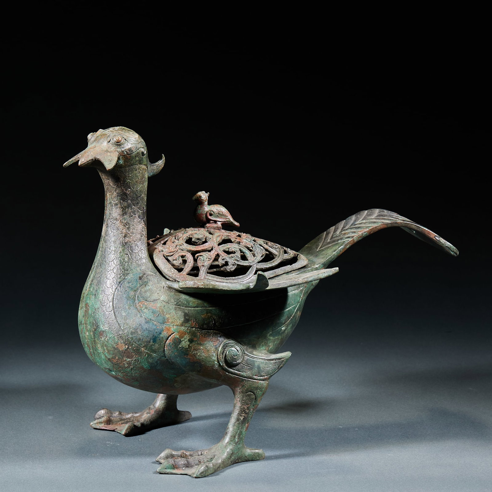 Bronze Incense Censer: Bronze Incense Censer: Pure bronze cast with regular vessel shape, primitive patterns on body, stable double beast ears and three-foot structure, mild aged patina. Specifications: height 21.5cm, lengt