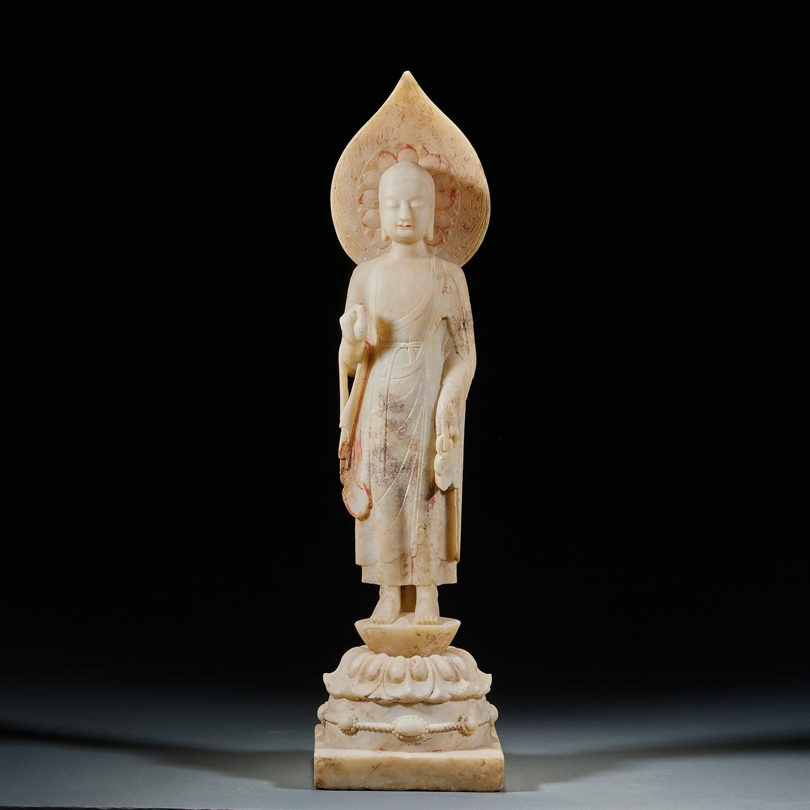 White Marble Guanyin Statue with Nimbus: White Marble Guanyin Statue with Nimbus: Round carved white marble statue with dignified benevolent Guanyin figure, nimbus decorated with lotus petal patterns, regular lotus throne base and natural
