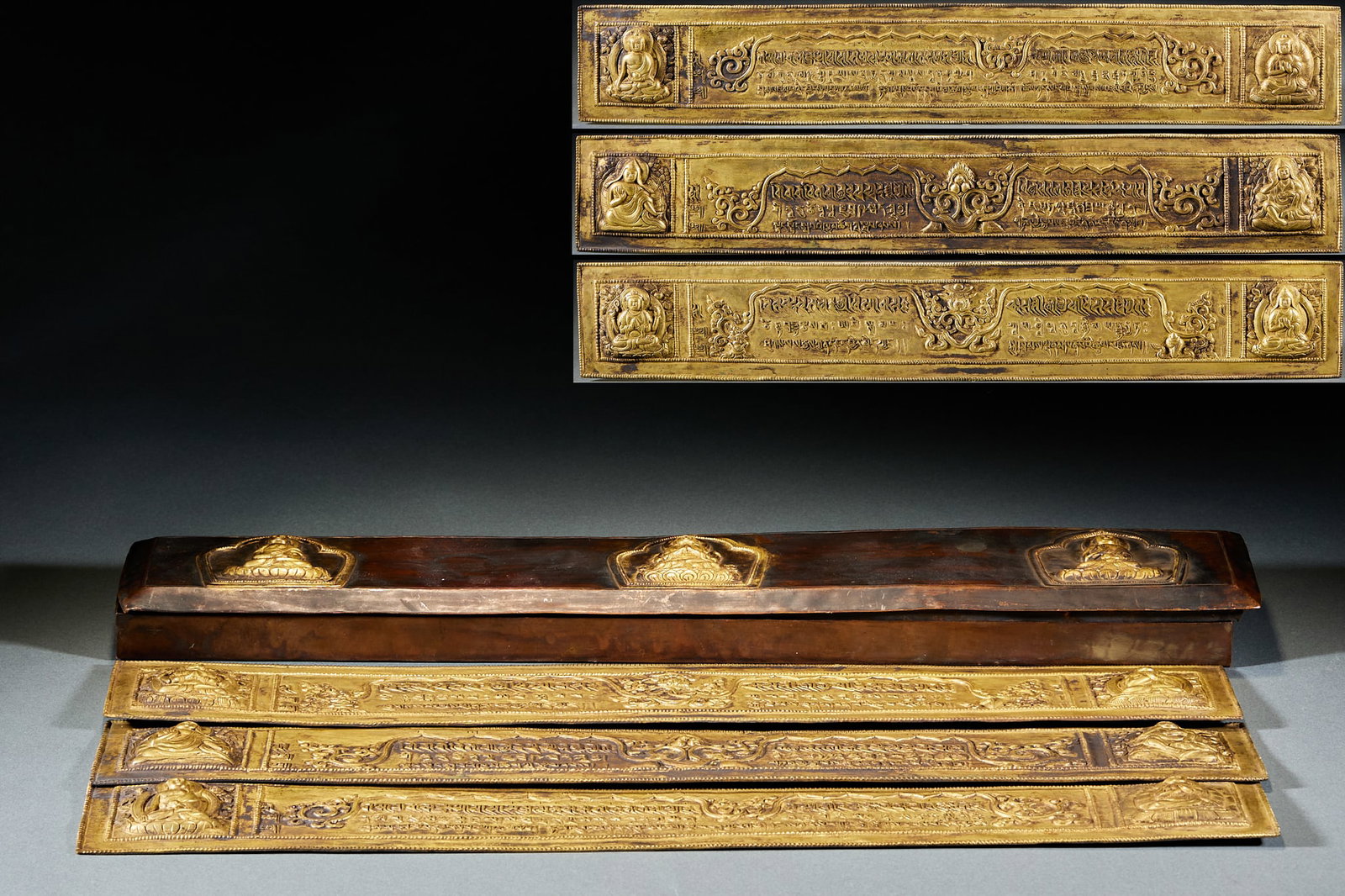 Gilt Bronze Buddhist Scriptures in Sanskrit Folder Binding: Gilt Bronze Buddhist Scripture in Sanskrit Folder Binding: Gilt bronze crafted in standard Sanskrit folder binding form, surface relief carved with Buddha statues and Sanskrit mantras, intricate patte