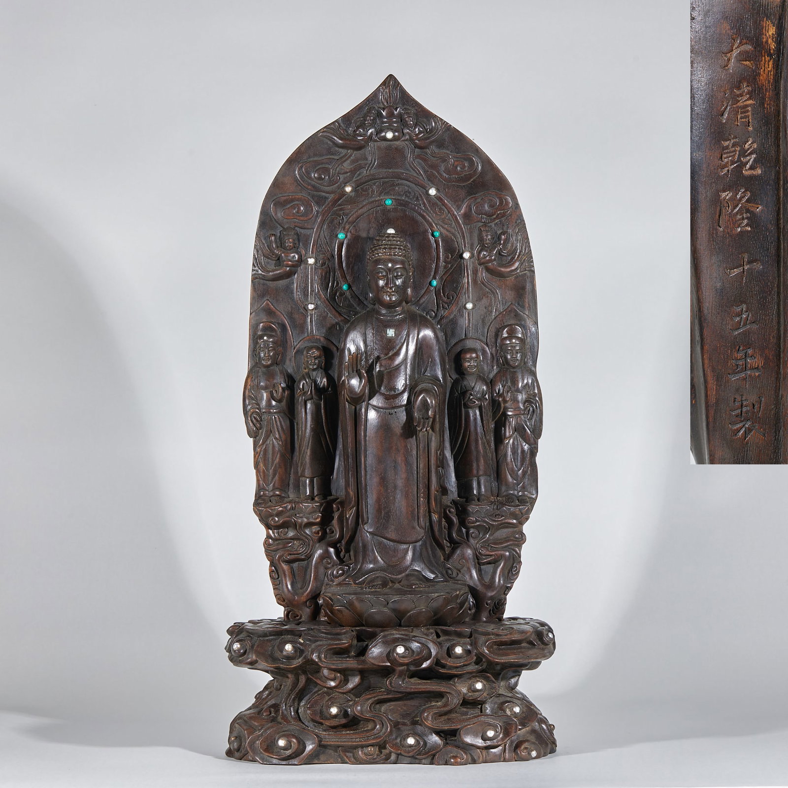 Agarwood Sakyamuni Preaching Statue: Agarwood Sakyamuni Preaching Statue: Round carved from single agarwood log, dignified Sakyamuni figure with flowing robe lines, finely carved auspicious cloud nimbus and mild natural patina.