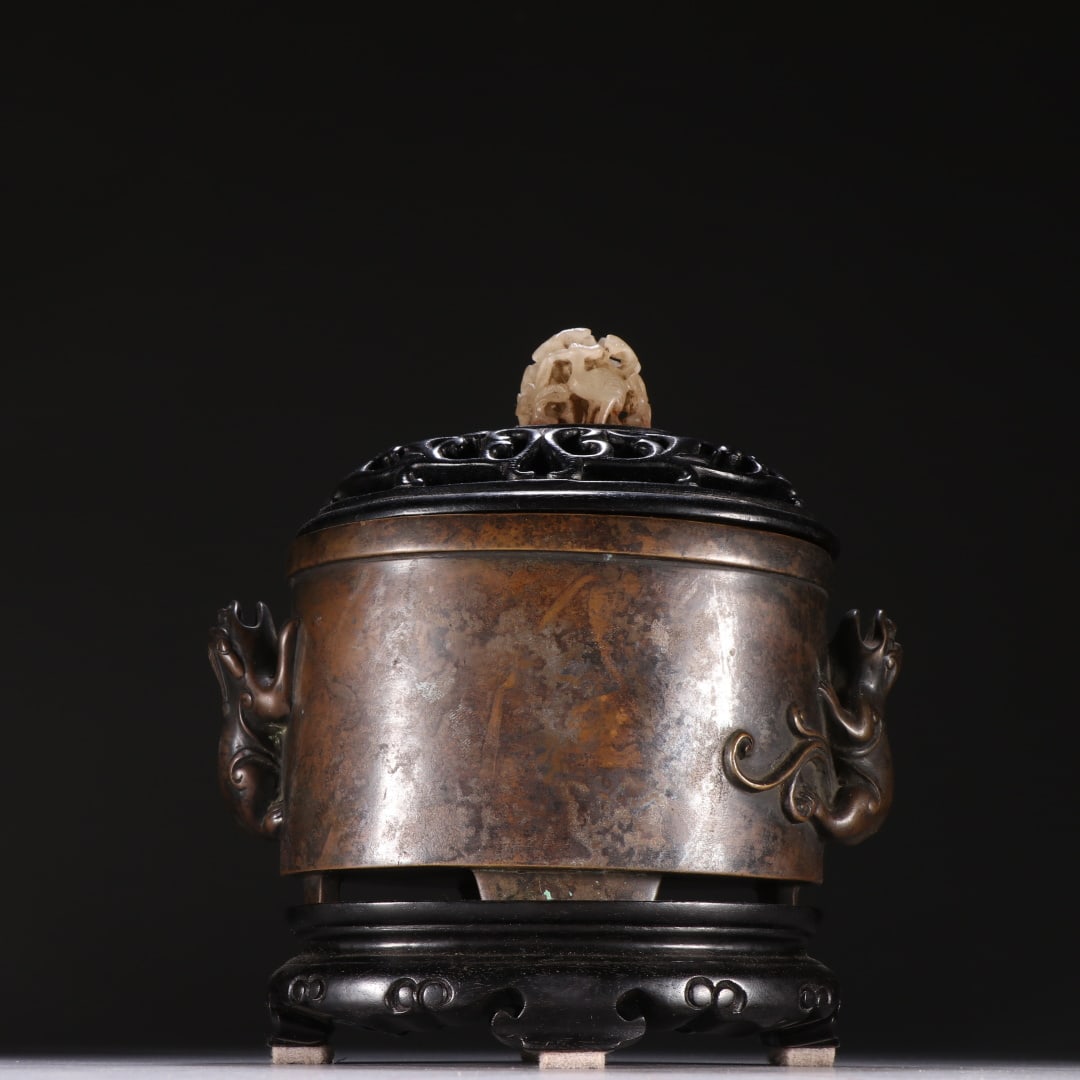 Xuande Mark Bronze Beast Ear Incense Burner: Xuande Mark Bronze Beast Ear Incense Burner: Regular bronze casting craft, decorated with beast ears, round elegant vessel shape, hollow carved lid patterns and clear "Xuande" base mark. Specification