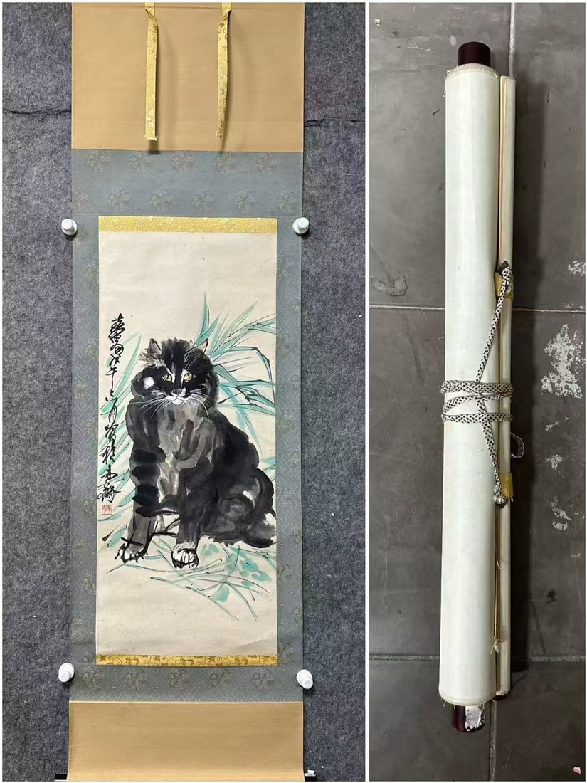 Huang Zhou Ink Cat Painting: Huang Zhou Ink Cat Painting: Paper colored painting with concise vivid brushwork, lifelike ink cat image, smooth lines and clear inscriptions. Painting core: height 91cm, width 39cm. Cultural value: A