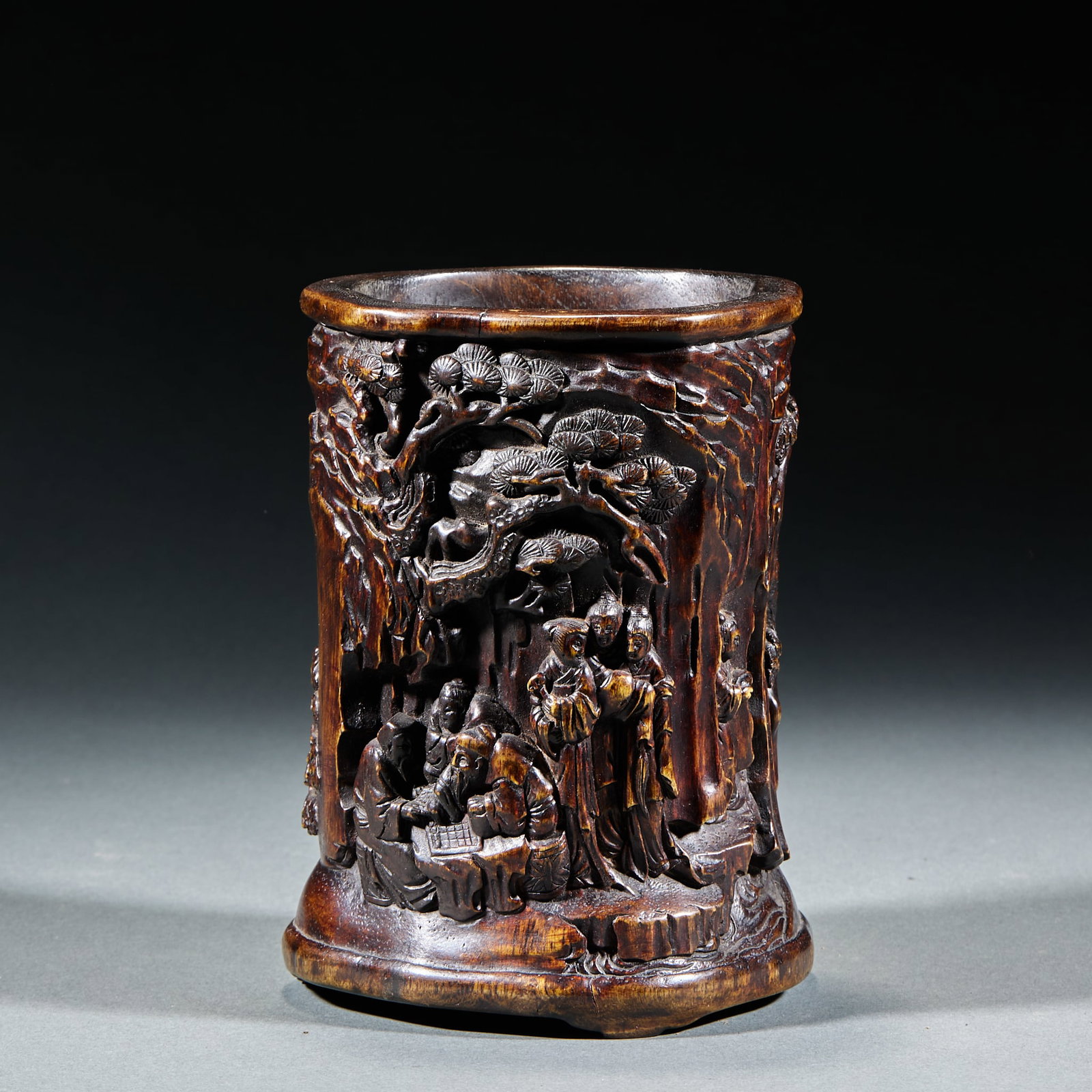 Agarwood Figure Story Brush Pot: Agarwood Figure Story Brush Pot: Mild fragrant agarwood wood, body relief carved with vivid figure story patterns in exquisite neat carving work and primitive aged patina. Specifications: height 16cm,