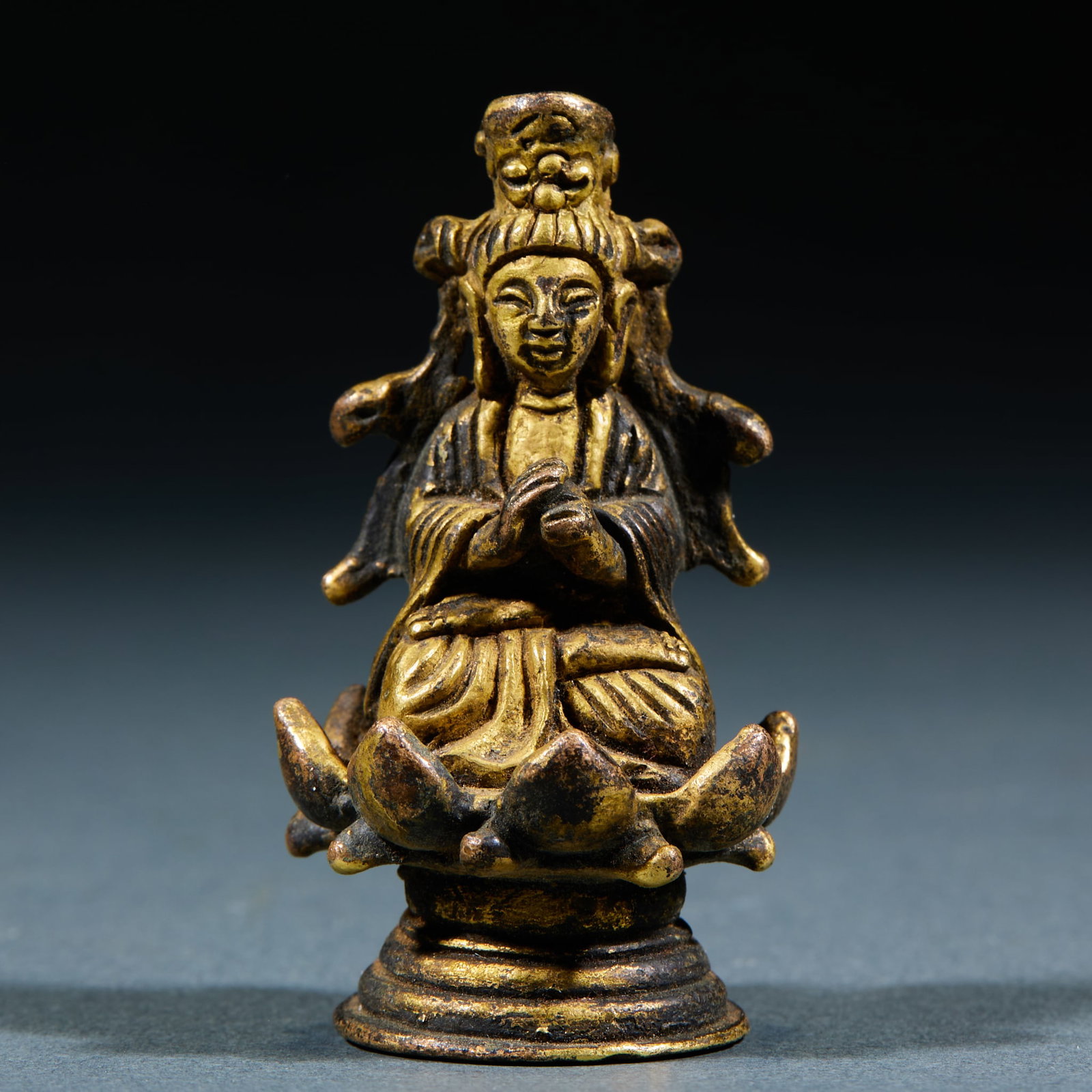 Liao Dynasty Gilt Bronze Guanyin Statue: Liao Dynasty Gilt Bronze Guanyin Statue: Delicate compact Liao gilt bronze casting craft, gentle dignified Guanyin figure with regular lotus throne base and well-preserved gilding. Specifications: hei