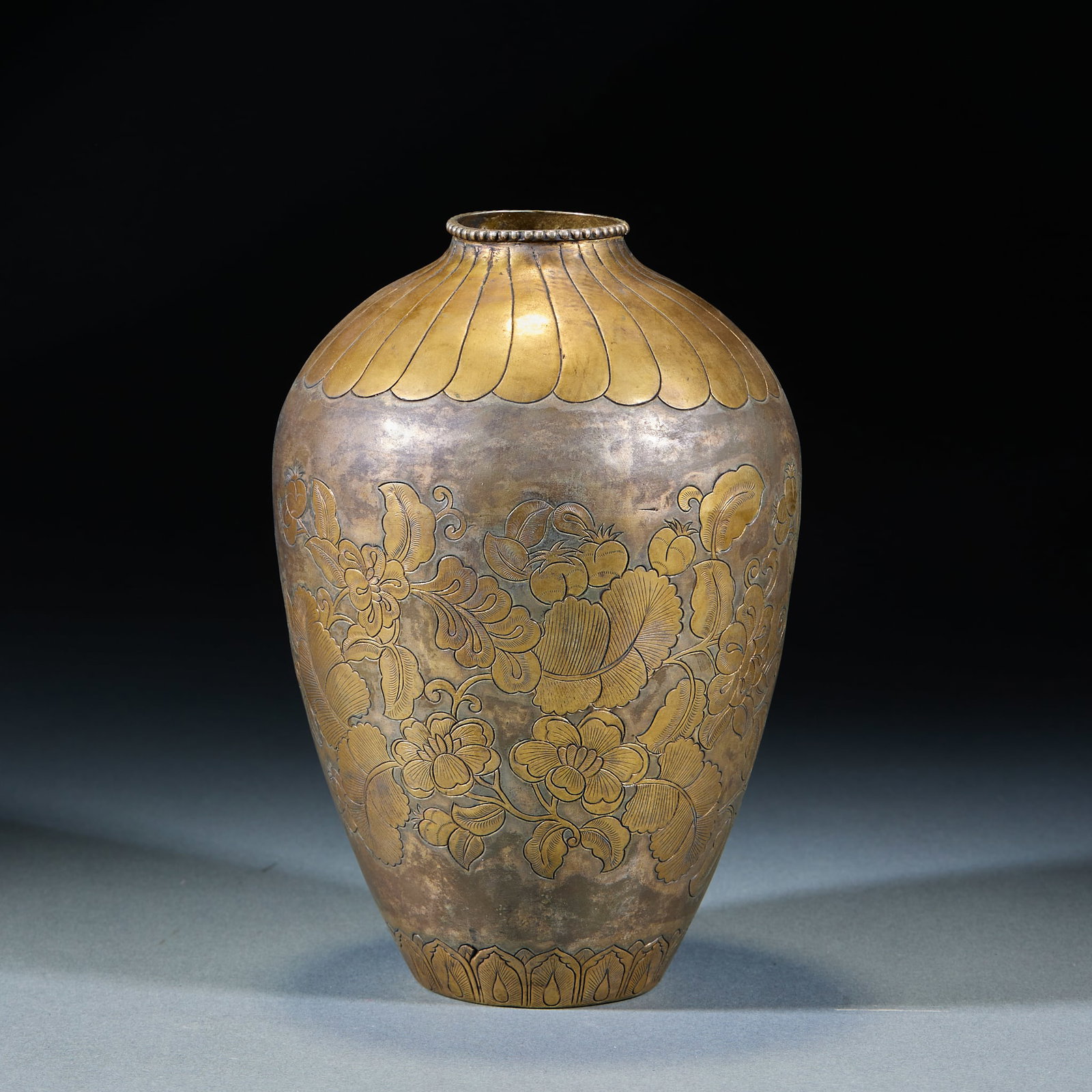 Qing Dynasty Gilt Bronze Chased Floral Pattern Olive Vase: Qing Gilt Bronze Chased Floral Pattern Olive Vase: Gilt bronze crafted via hammering and chasing techniques, body decorated with interlocking floral patterns in delicate neat carving work and well-pre