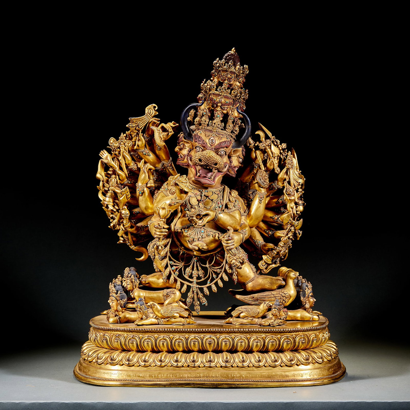 Xuande Mark Gilt Bronze Yamantaka Made Under Potala Palace Supervision: Ming Gilt Bronze Yamantaka Statue: Imposing multi-arm multi-leg iconography with full gilding and meticulous lifelike detailing. Base marked “Chenghua Period Made of Great Ming”. Height 49cm, 