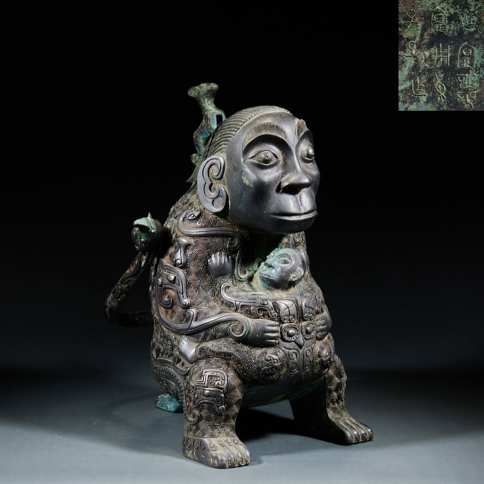 Bronze Ape Headed Beam You Vessel: Shang-Zhou Bronze Ape-Head Liang You Vessel: Distinctive archaic form modelled after ape figure, primitive patterns and natural aged rust. Height 32cm, length 18cm, width 22cm. A rare category among S