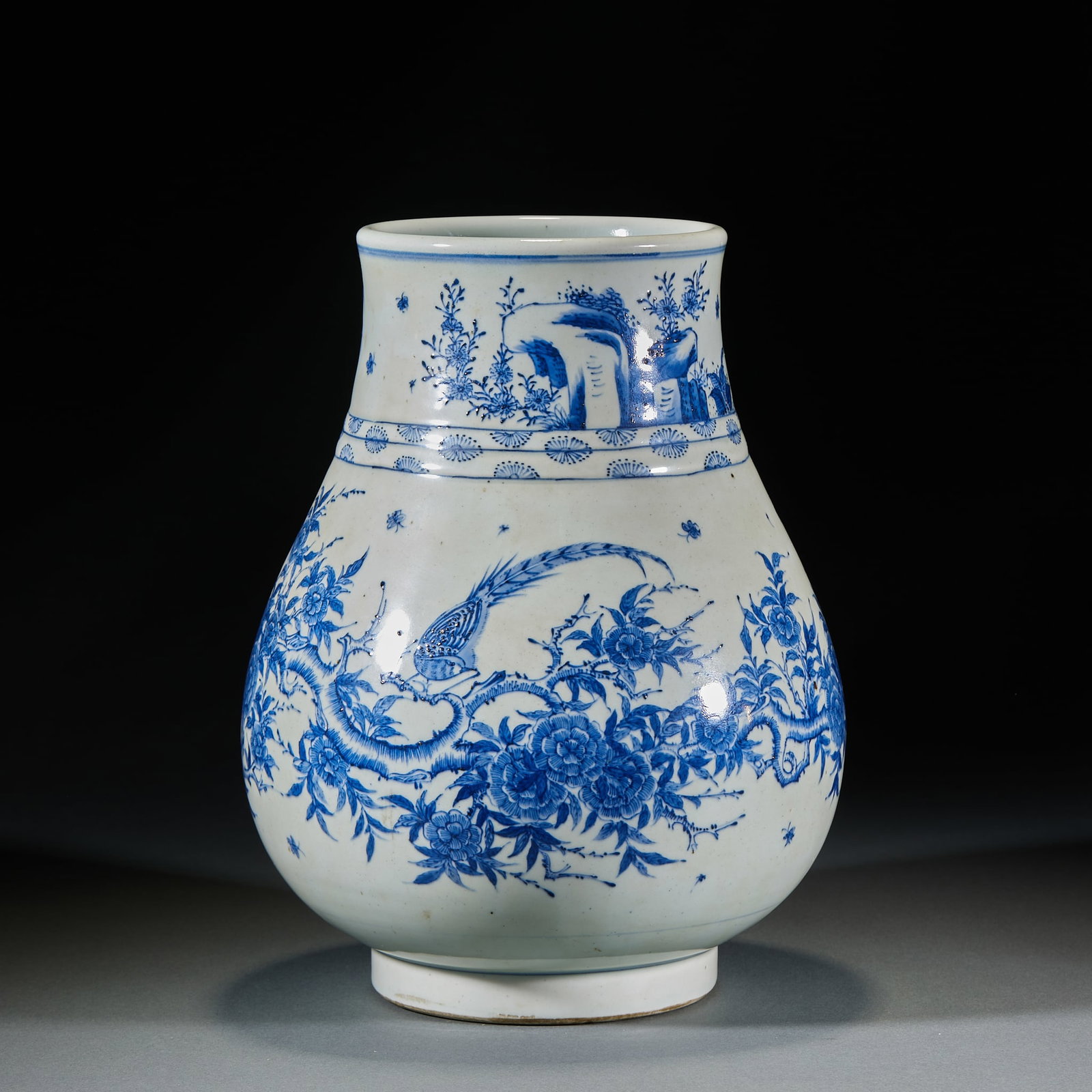 Qing Blue and White Wealth and Eternal Blessing Olive Zun: Qing Underglaze Blue Fortune and Longevity Olive Vase: Stable cobalt blue tone painted with flower-and-bird patterns symbolizing blissful companionship and prosperity. Elegant standard vessel form. He