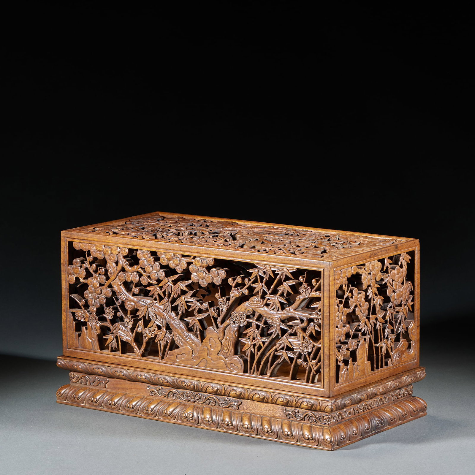 Qing Dynasty Golden Nanmu Openwork Incense Box: Qing Golden Nanmu Openwork Incense Box: Crafted of golden nanmu, openwork carved with pine, bamboo and plum patterns in fine detail, distinct natural wood grain. Height 17cm, length 32.5cm, width