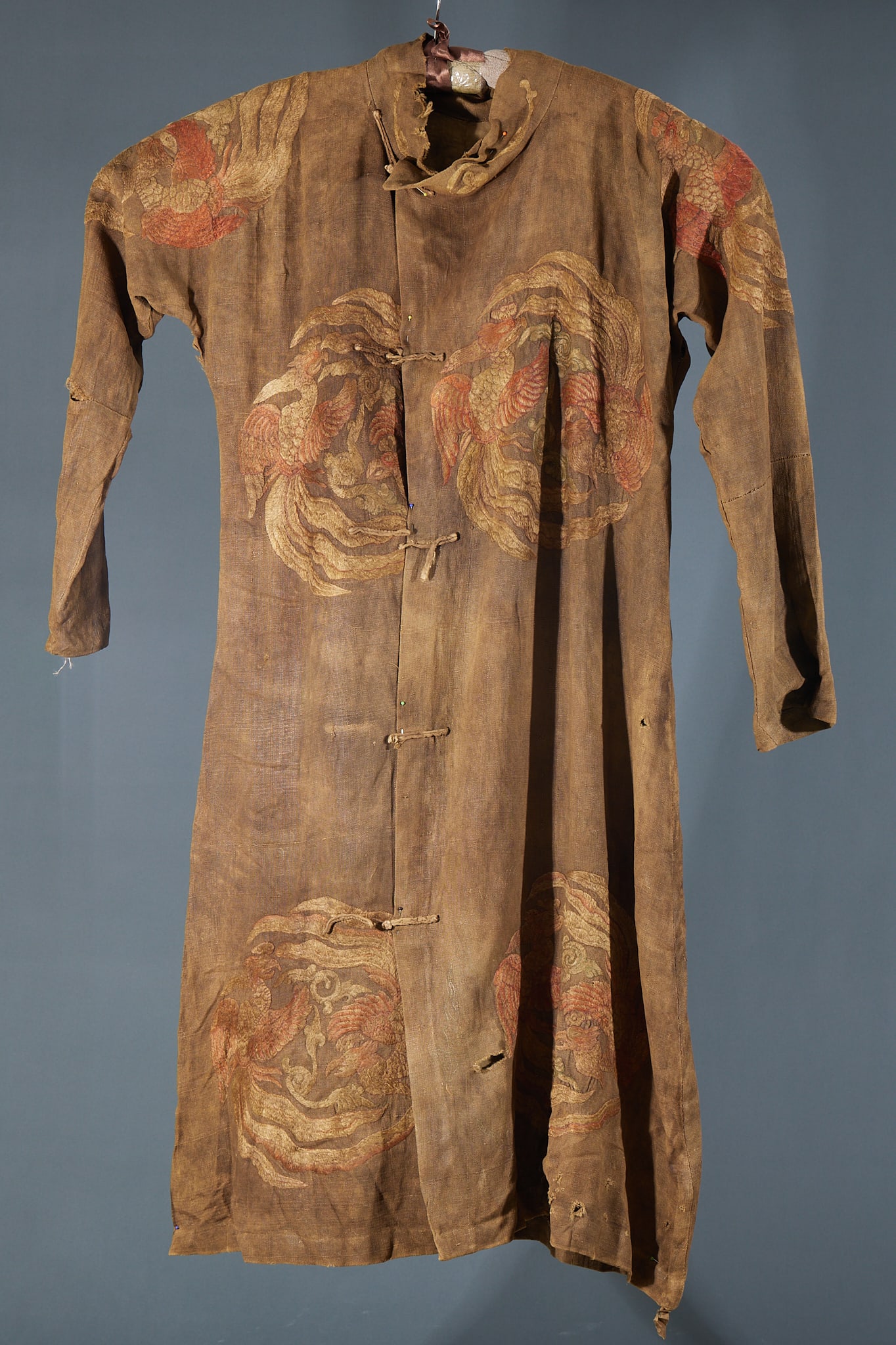 Embroidered Phoenix Robe: Embroidered Phoenix Robe: Silk embroidery themed on phoenix motifs, gorgeous elegant colors, layered meticulous stitches and standard formal structure. Garment length 111cm, sleeve length 158cm.