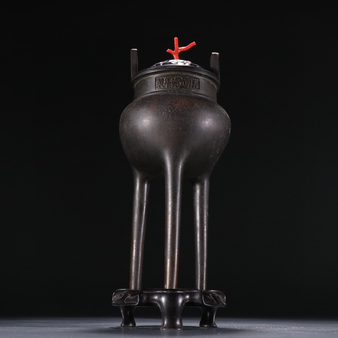 Xuande Mark Bronze Skyward Ear High-Foot Incense Burner: Xuande Bronze Upward-Ear Tall Foot Incense Burner: Cast of refined copper with tall archaic vessel form, unique upward ears and tall foot design, inscribed base mark and thick mellow patina. Height
