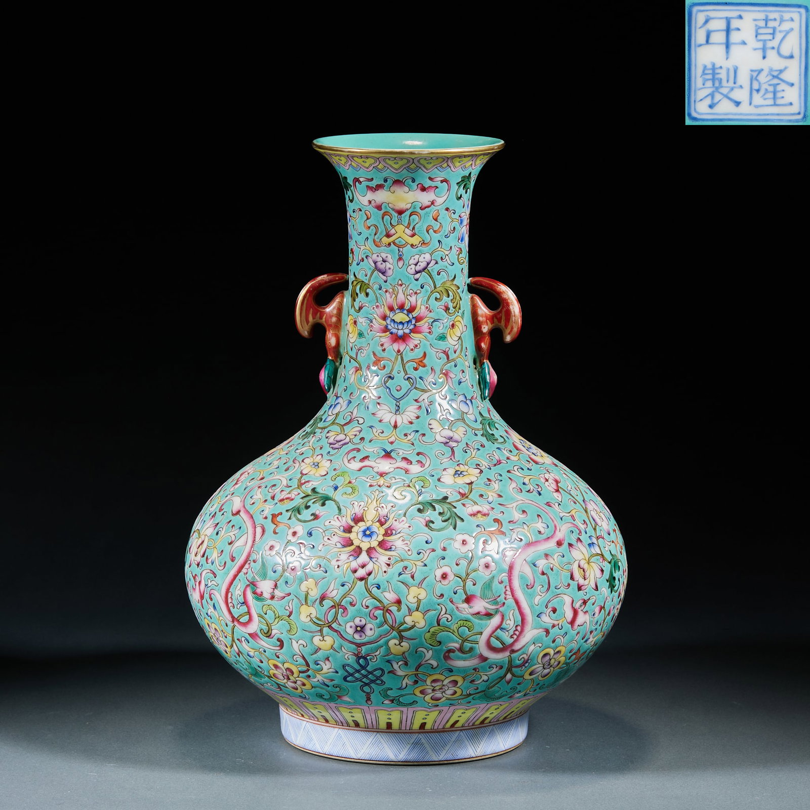 Qianlong Mark Famille Rose Flower and Dragon Pattern Vase: Qianlong Famille Rose Flower and Dragon Appreciation Vase: Porcelain with pine green glaze ground, fully painted with gorgeous rich famille rose floral and dragon patterns, bearing Qianlong period bas