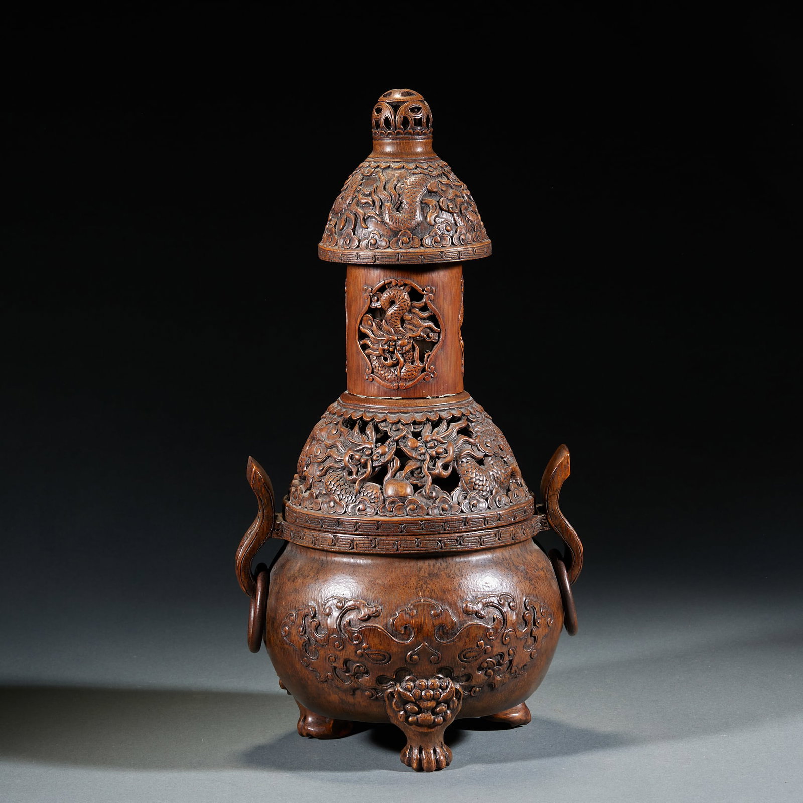 Qing Dynasty Bamboo Carved Dragon Pattern Three-Foot Incense Pagoda Burner: Qing Bamboo Carved Dragon Pattern Three-Foot Pagoda Incense Burner: Carved from old bamboo root, layered openwork carved dragon patterns with exquisite intricate craft, stable three-foot design and