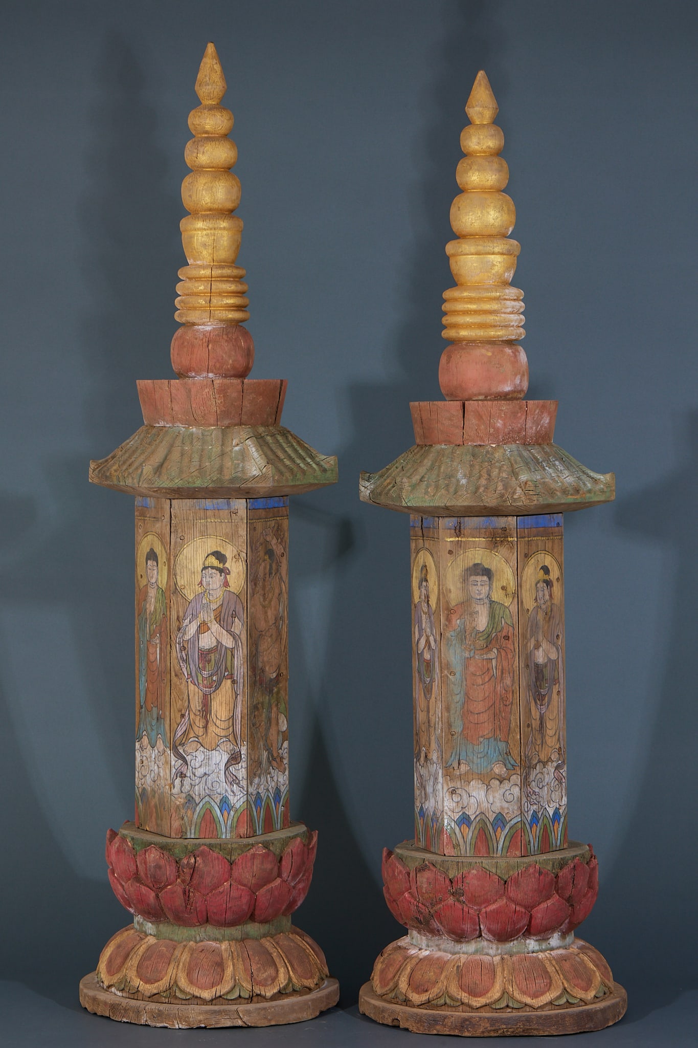 Cypress Wood Scripture Pagodas, A Pair: Cypress Painted Scripture Pagoda Pair: Cypress carved pagodas painted with Buddha images and sutra texts on the body, lotus base and pagoda spire top design, perfectly preserved as a pair. Height