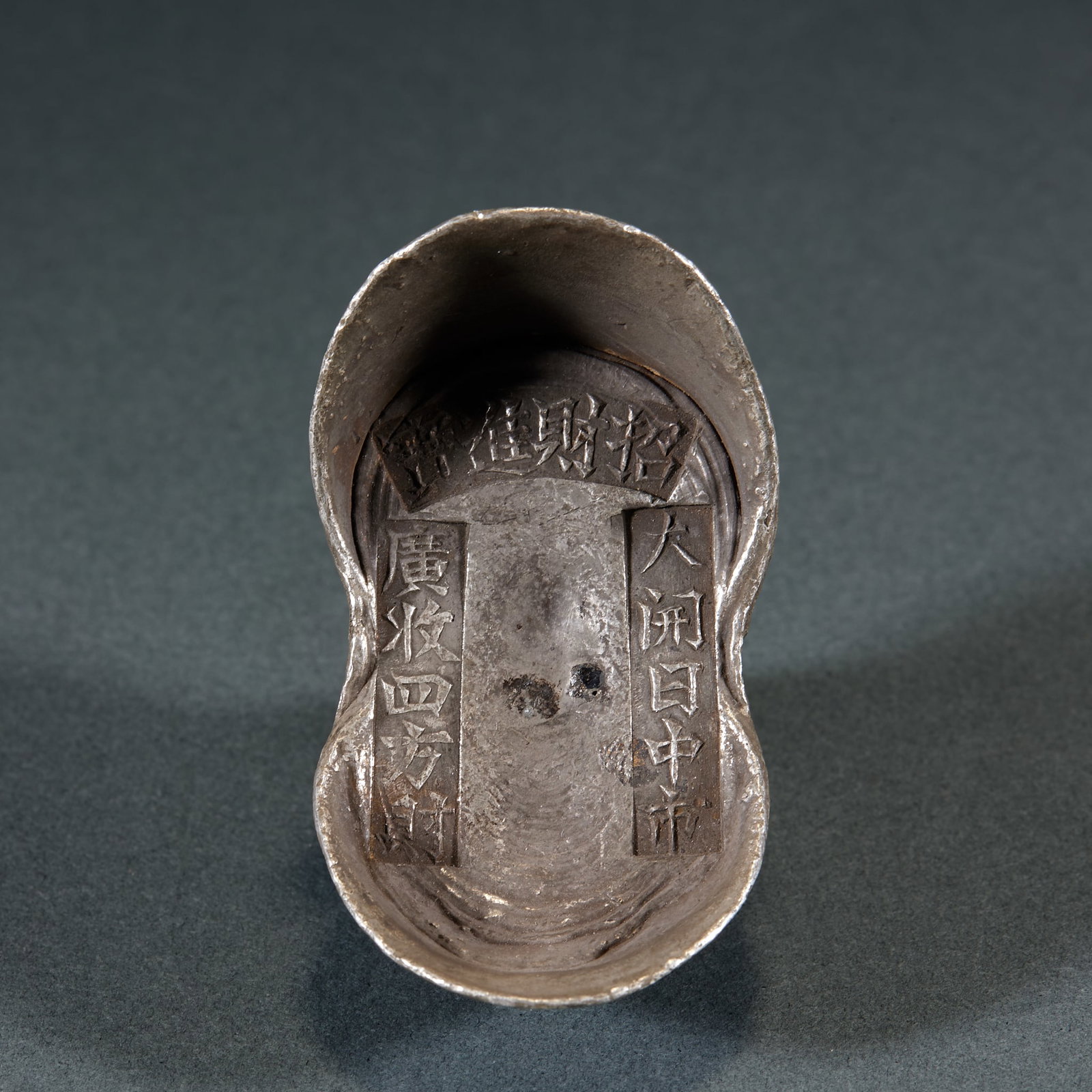 Wealth Attraction Silver Ingot: Prosperity & Fortune Silver Ingot: Cast of pure silver in traditional sycee form, surface chased with auspicious inscriptions of “Attracting Wealth and Treasure”, neat clear carving lines, mil