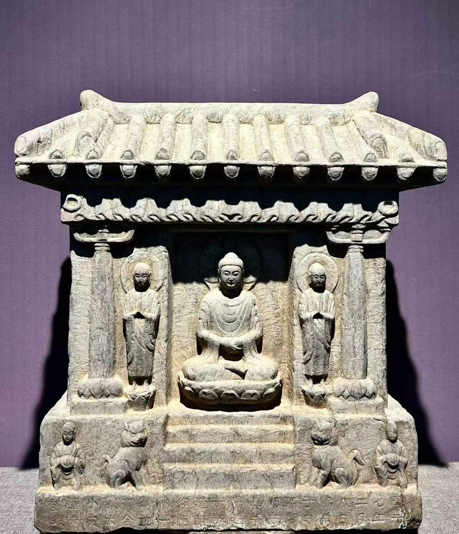 Tang Dynasty Bluestone Buddhist Niche: Tang Blue Stone Buddhist Niche: Carved of blue stone in palace-style structure, relief-carved with one Buddha and two disciples inside the niche, inscribed colophon at the bottom, primitive solemn sty