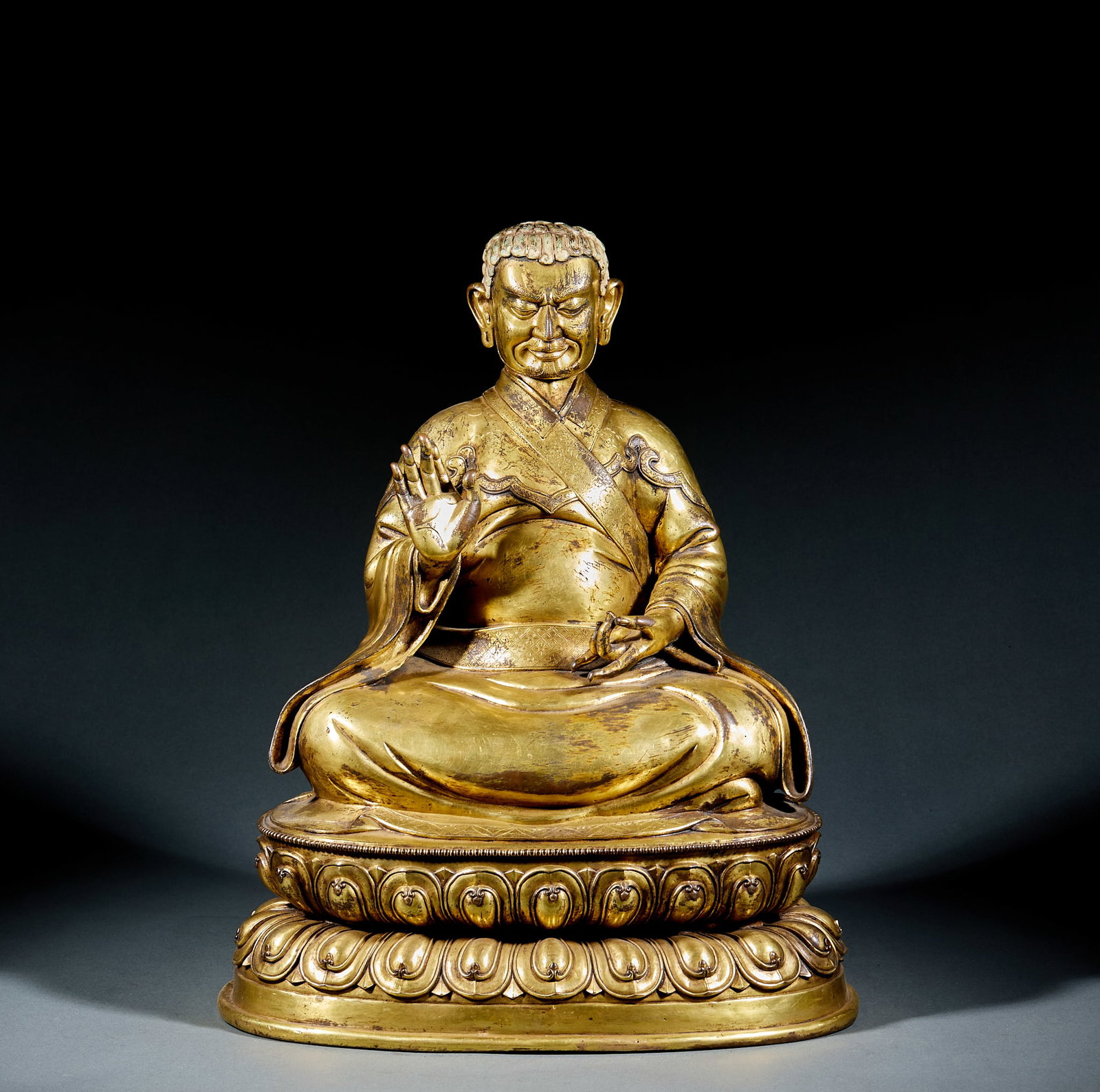 Gilt Bronze Sakya School Patriarch: Gilt Bronze Sakya School Patriarch Statue: Gilt bronze cast with dignified iconography, flowing robe lines, thick full gilding and exquisite detailed lotus throne craft. Height 44cm, length 36cm,