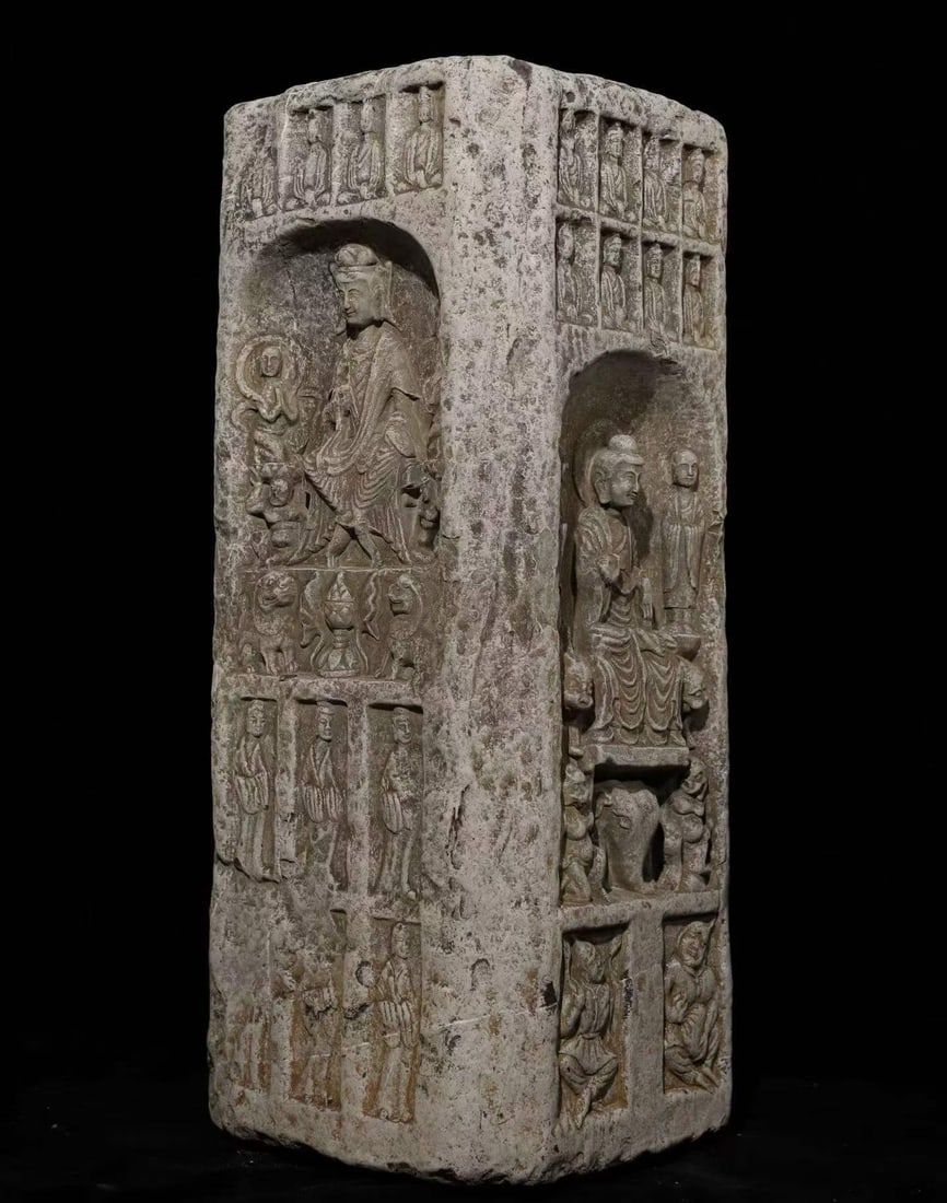 Northern Wei Bluestone Thousand Buddha Pillar: Northern Wei Blue Stone Thousand Buddha Pillar: Blue stone carved pillar relief-decorated with numerous Buddhist niches and statues, primitive solemn archaic style. Height 93cm, diameter 40cm. Norther