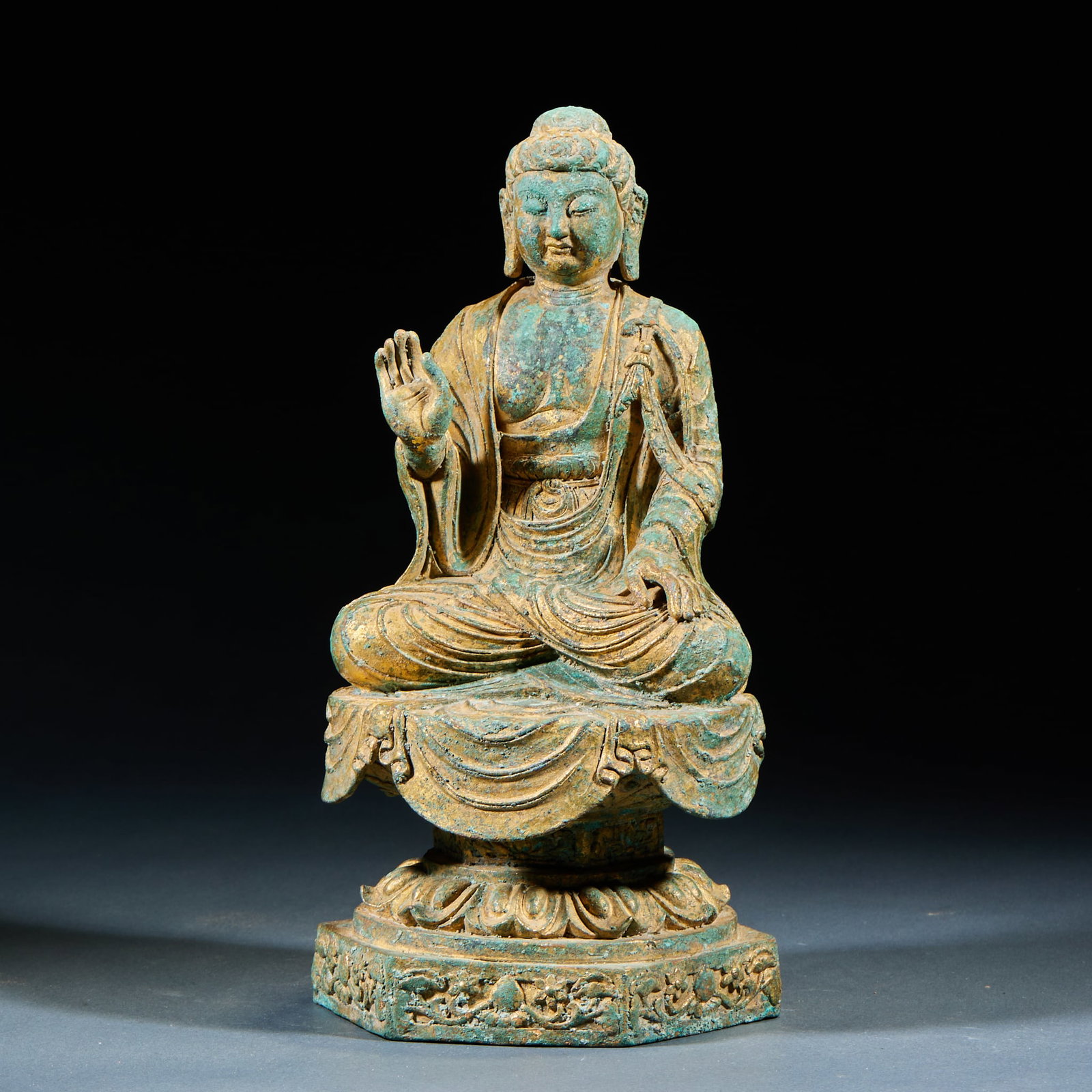 Gilt Bronze Sakyamuni Buddha: Gilt Bronze Sakyamuni Buddha: Gilt bronze cast Buddha seated on lotus throne with solemn dignified demeanor. Height 25cm, diameter 13cm. Ancient gilt bronze Buddha statue with exquisite craftsmanship,