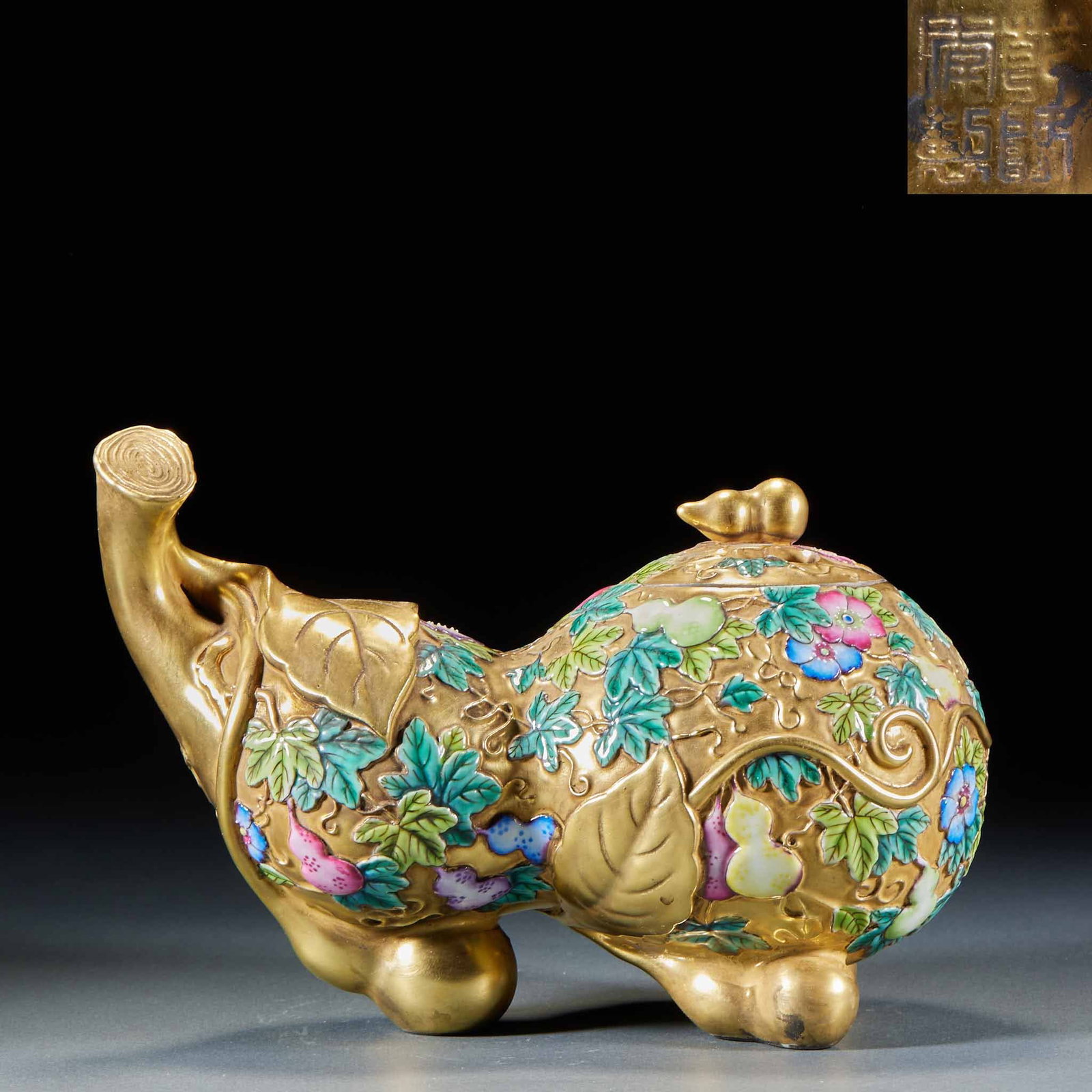 Qianlong Mark Gold Ground Famille Rose Flower Gourd Incense Burner: Qianlong Mark Gold Ground Famille Rose Flower Gourd Incense Burner: Porcelain gourd-shaped vessel decorated with gold ground famille rose flower patterns, base inscribed "Made in Qianlong Reign". Heig