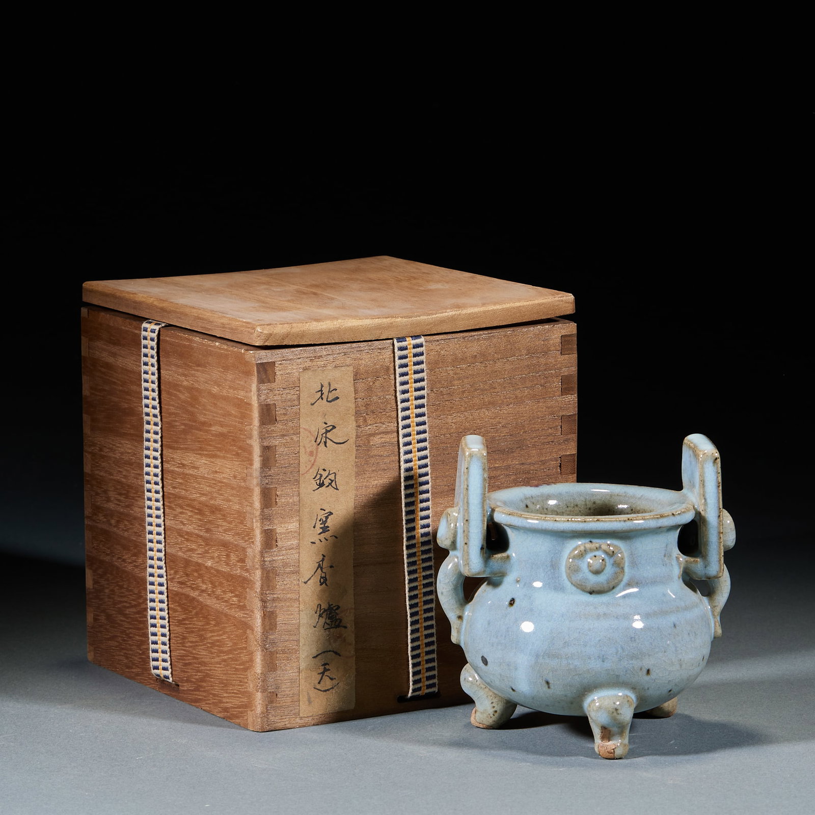 Northern Song Jun Kiln Incense Burner: Northern Song Jun Kiln Incense Burner: Sky-celadon glaze with natural kiln transmutation, double-ear three-foot structure, primitive elegant glaze tone. Height 11.5cm, diameter 11.5cm. Representative 