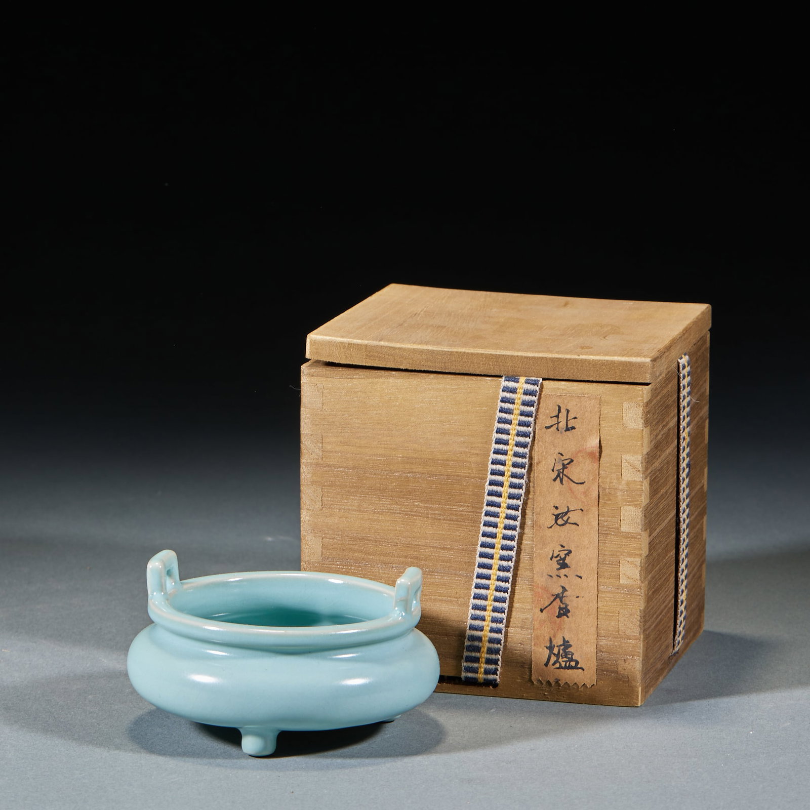 Northern Song Ru Kiln Incense Burner: Northern Song Ru Kiln Incense Burner: Sky-celadon glaze with three-foot furnace form, pure mild glaze quality and compact elegant shape. Height 5cm, diameter 9.5cm. Refined Northern Song Ru Kiln porce