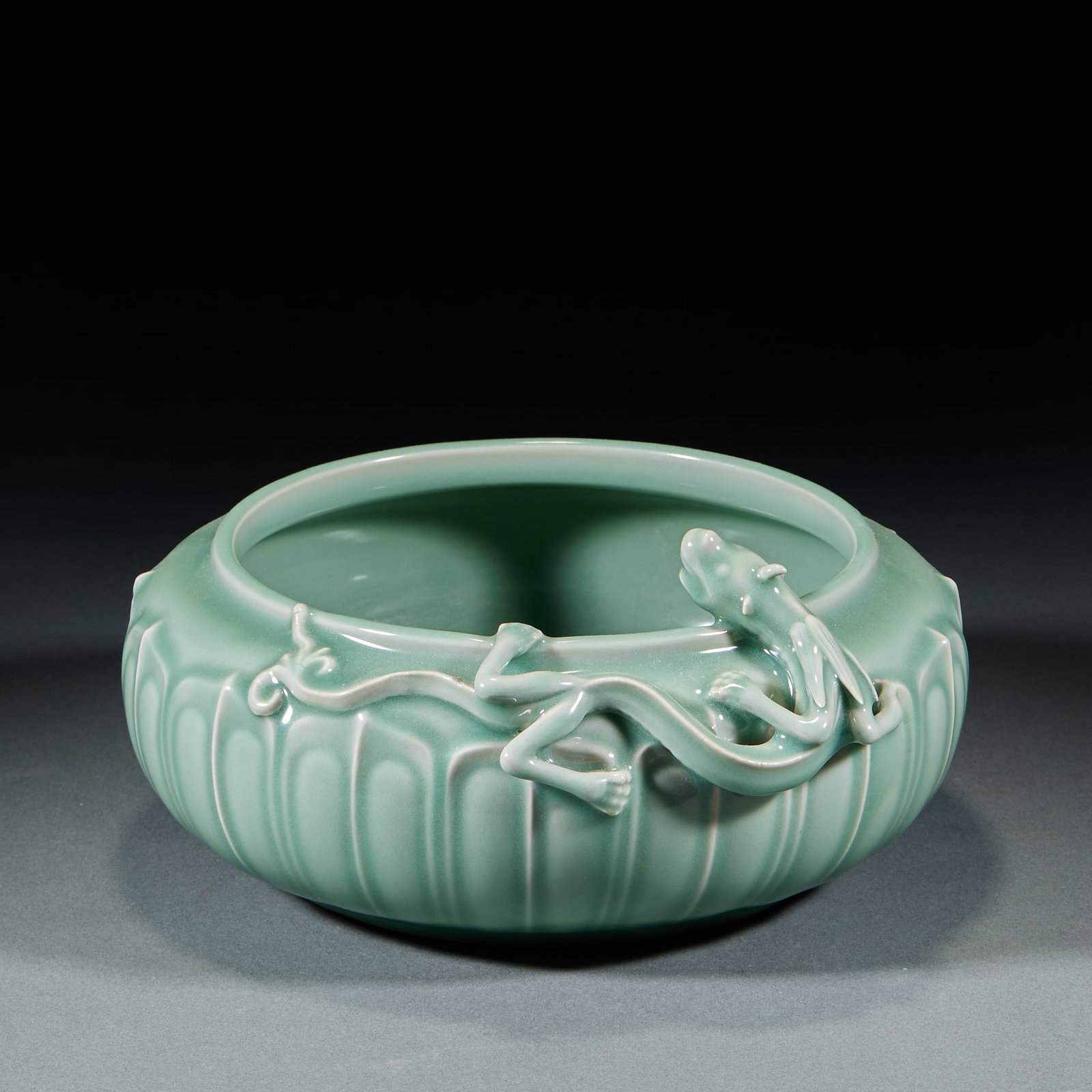 Longquan Kiln Relief Chilong Brush Washer: Longquan Kiln Relief Chilong Dragon Brush Washer: Porcelain with celadon glaze relief chilong dragon patterns, grand atmospheric washer form. Height 12cm, diameter 26cm. Fine Longquan celadon literati