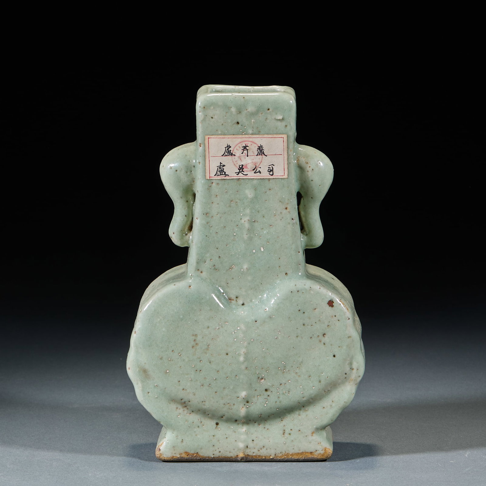 Southern Song Longquan Kiln Elephant Ear Vase: Southern Song Longquan Kiln Elephant Ear Vase: Porcelain with plain celadon glaze and unique elephant ear design, primitive mild glaze tone, preserved with old collection label. Height 24cm, length 15
