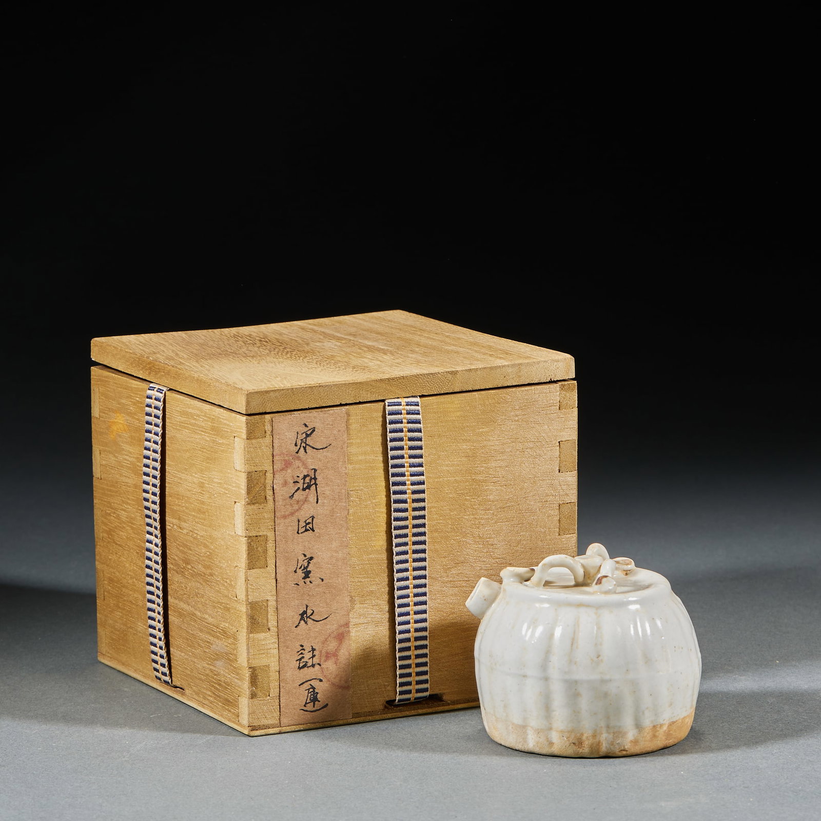 Song Hutian Kiln Water Ewer: Song Hutian Kiln Water Dropper: Porcelain with plain bluish-white glaze, round smooth shape and mild elegant glaze tone. Height 5.5cm, diameter 6cm. Simple elegant Song Hutian Kiln literati ware with 
