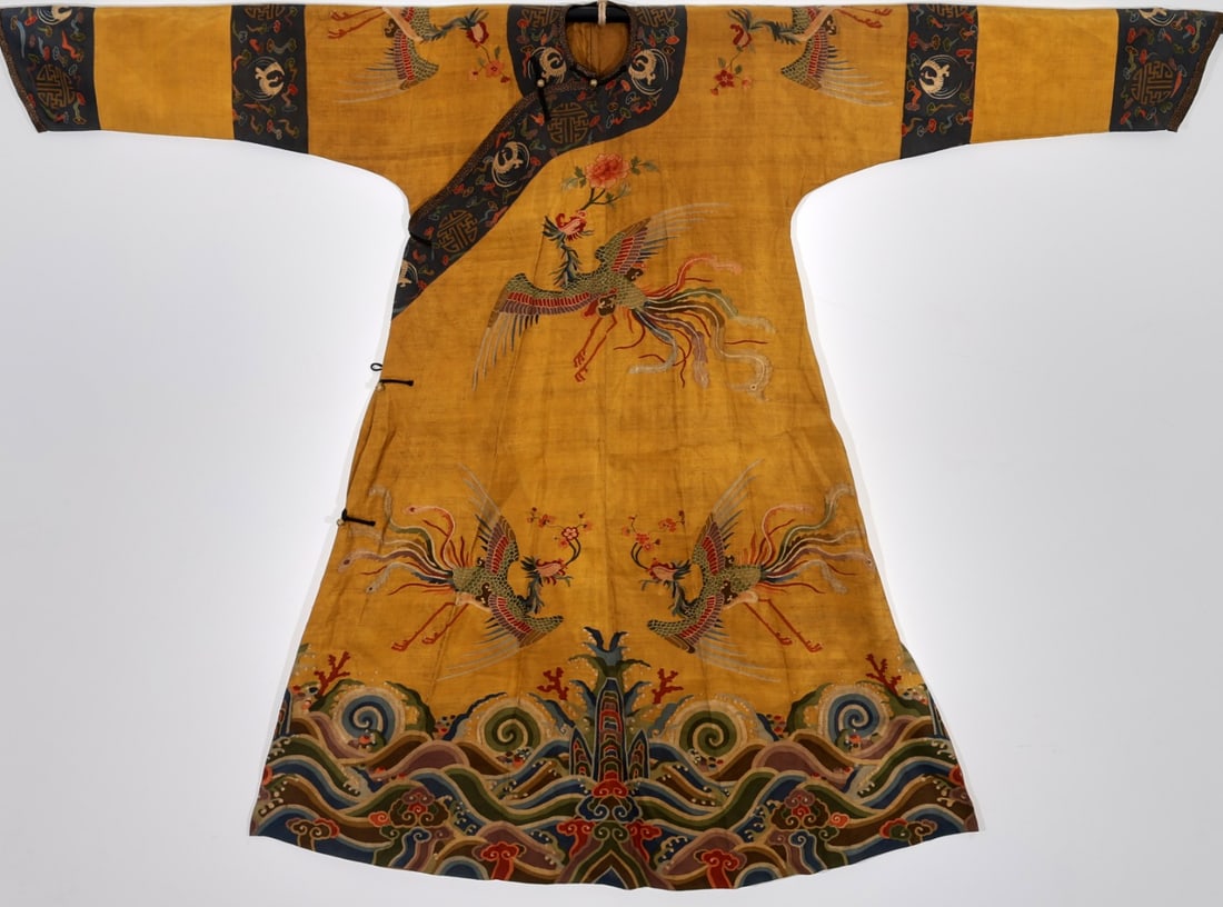 Qing Dynasty Bright Yellow Kesi Phoenix Pattern Female Ceremonial Robe: Qing Dynasty Royal Yellow Kesi Phoenix Pattern Women's Formal Robe: Crafted with royal bright yellow Kesi base by ancient warp-weft cut Kesi skill, woven with phoenix, auspicious cloud and sea river c