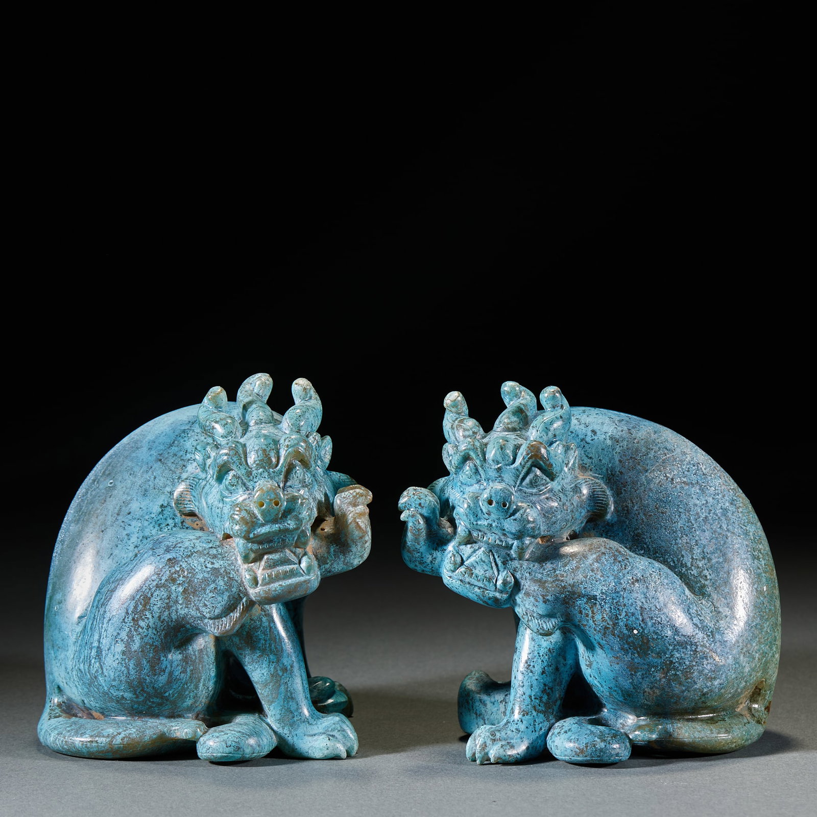 Turquoise Auspicious Beast: Turquoise Mythical Beast: Carved from turquoise into sitting mythical beast shape with dignified expression; Height 10.5cm, length 9.5cm, width 8cm; An ancient display ornament with mild texture,